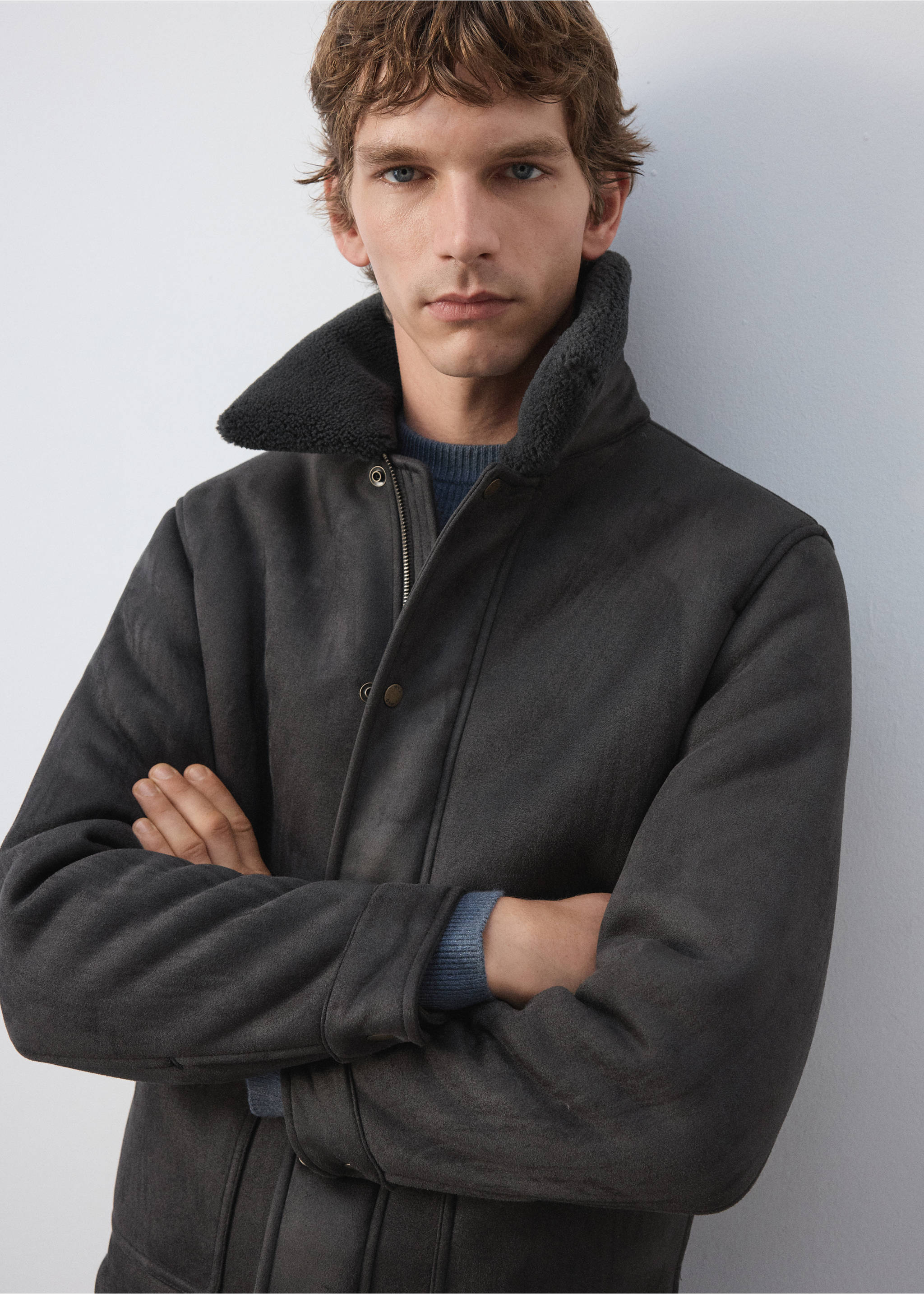 Dark grey jacket with high shearling-lined collar and front snaps, worn by a model., Dark Green. Ref: 37047889-00.