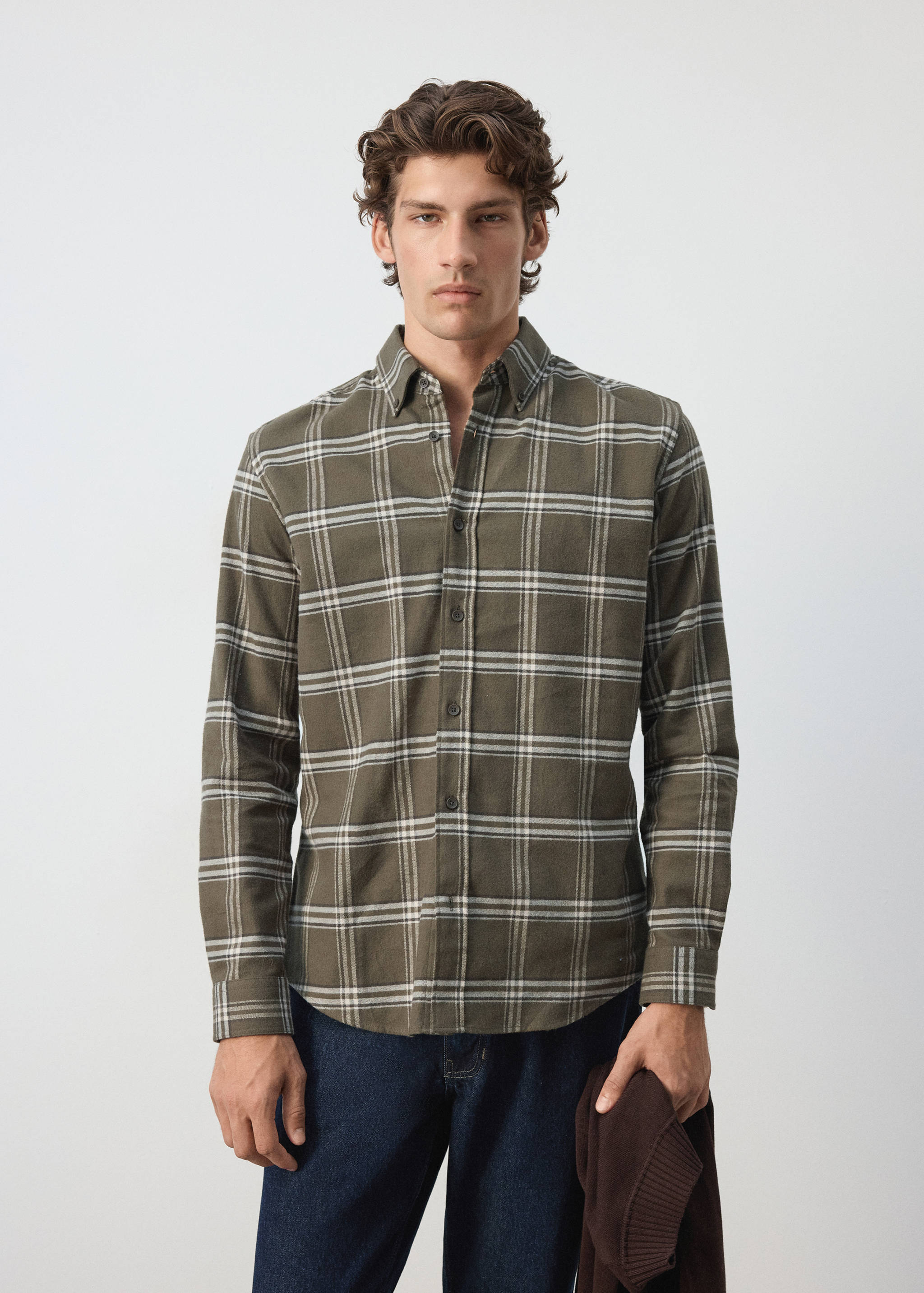Khaki green plaid overshirt with a button-down collar and dark front buttons.