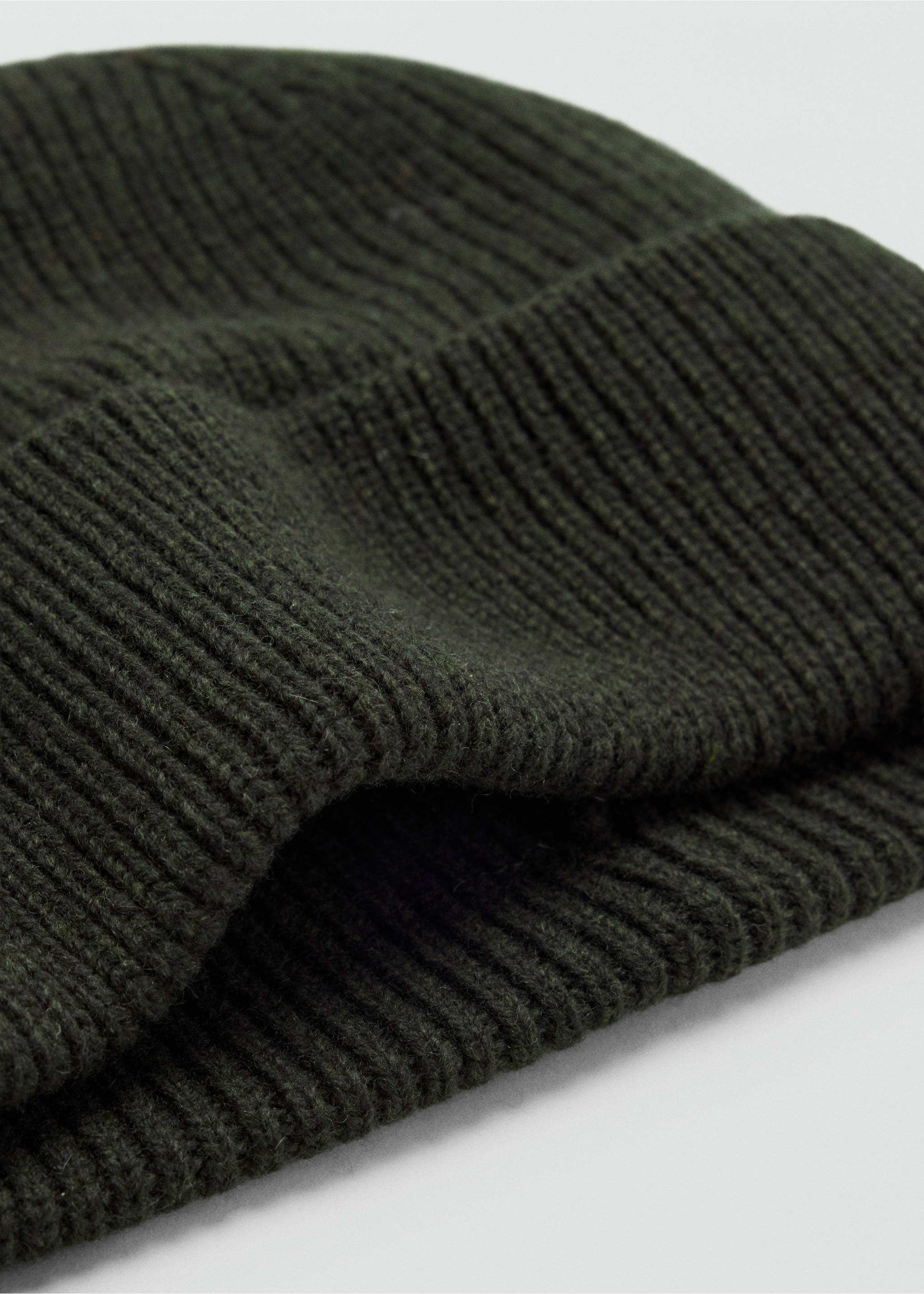 Dark green ribbed knit beanie in a close-up view., Khaki. Ref: 37047903-00.