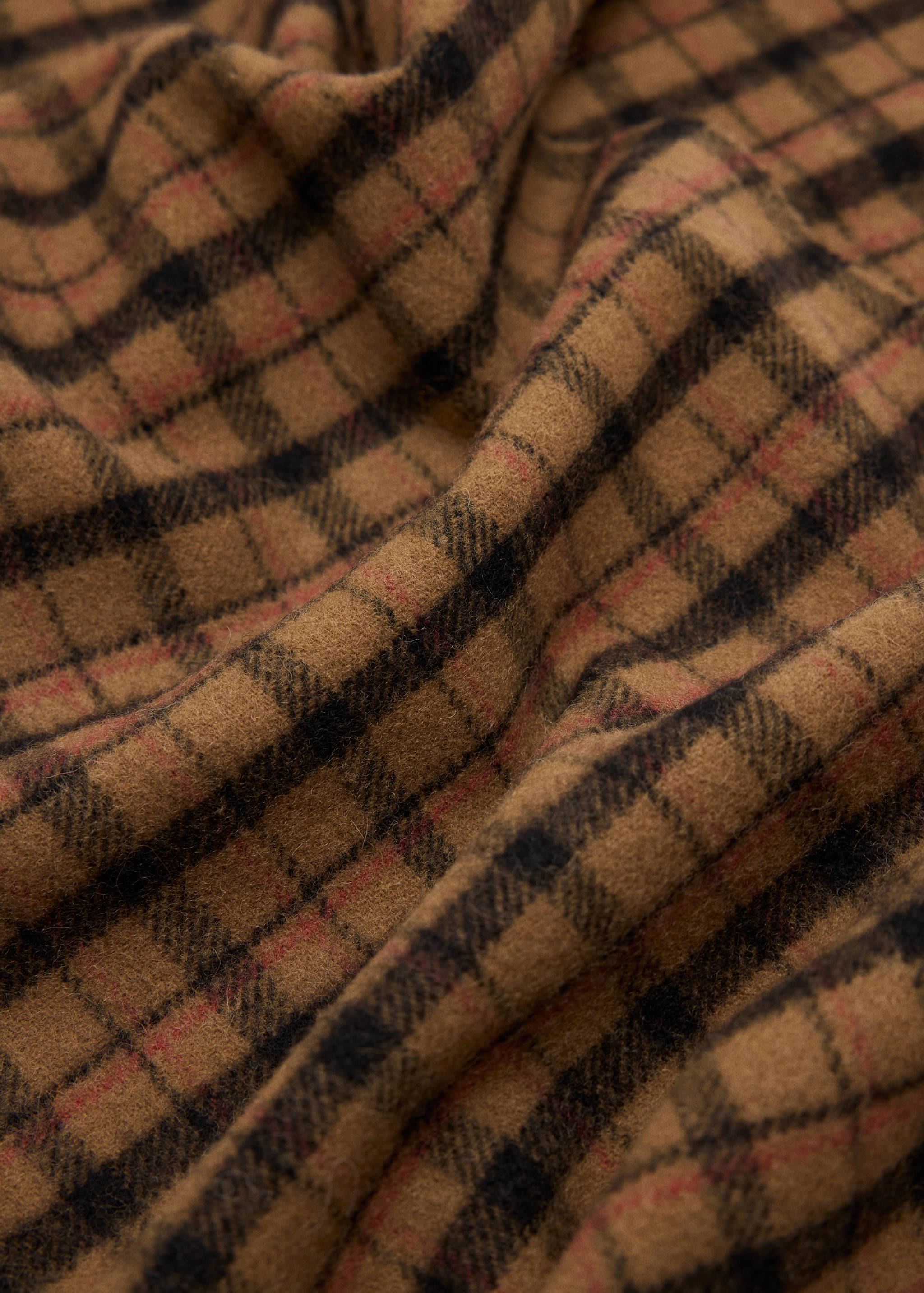 Brown plaid scarf with black and red check pattern.