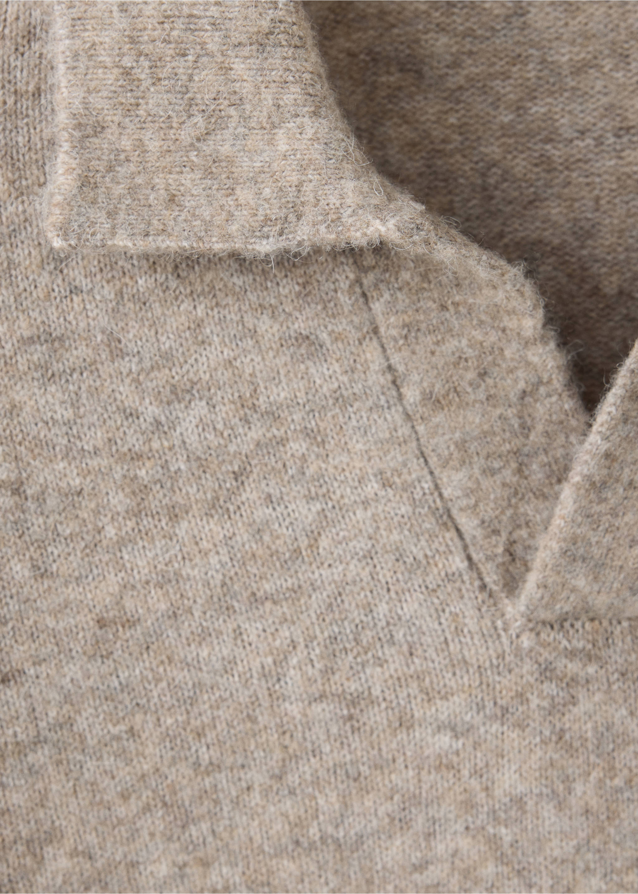 Close-up of a beige knitted polo collar and V-neck., Beige. Ref: 37047916-00.