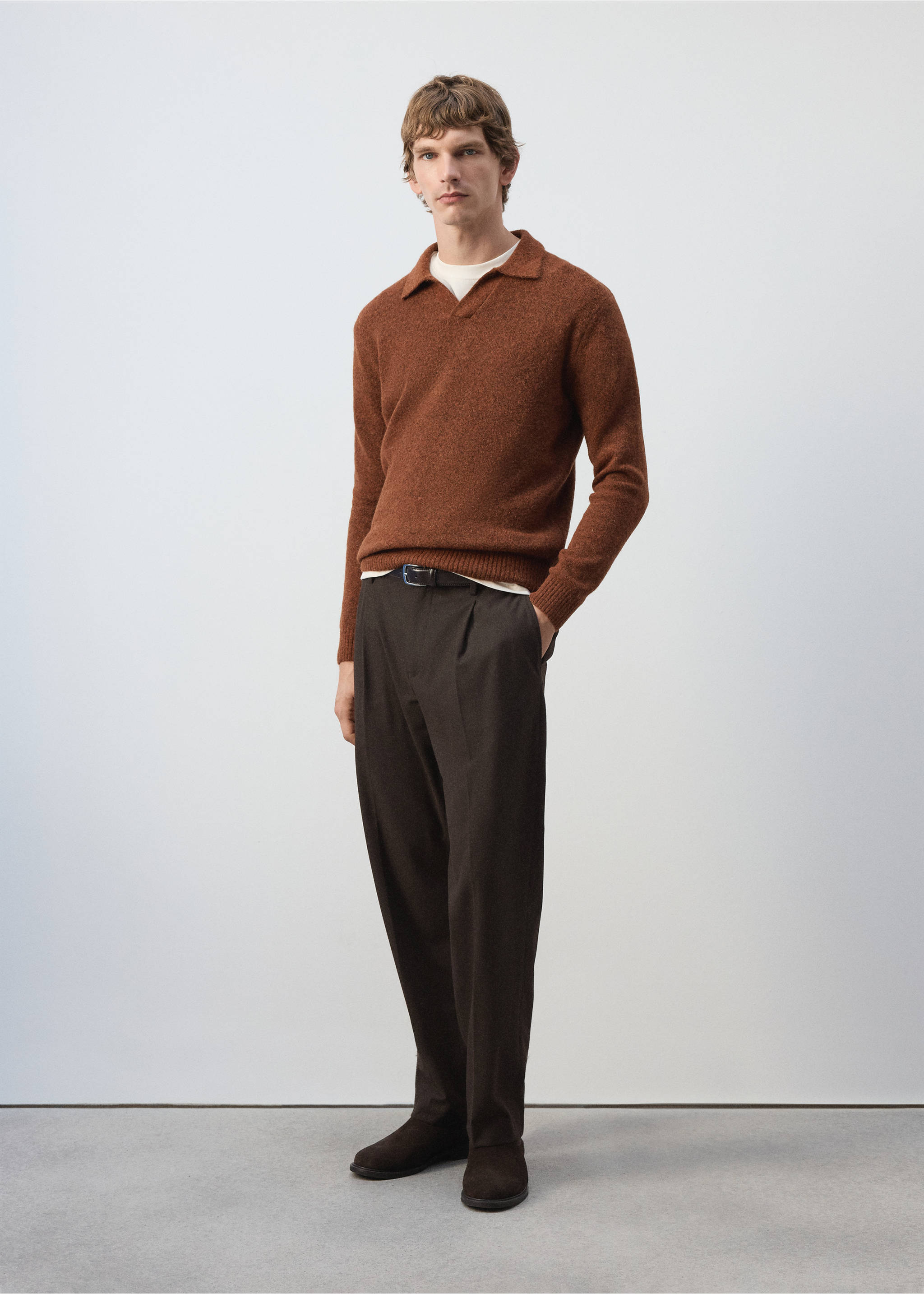 Brown knitted polo shirt with a V-neck collar, worn with dark brown trousers., Burnt Orange. Ref: 37047916-00.