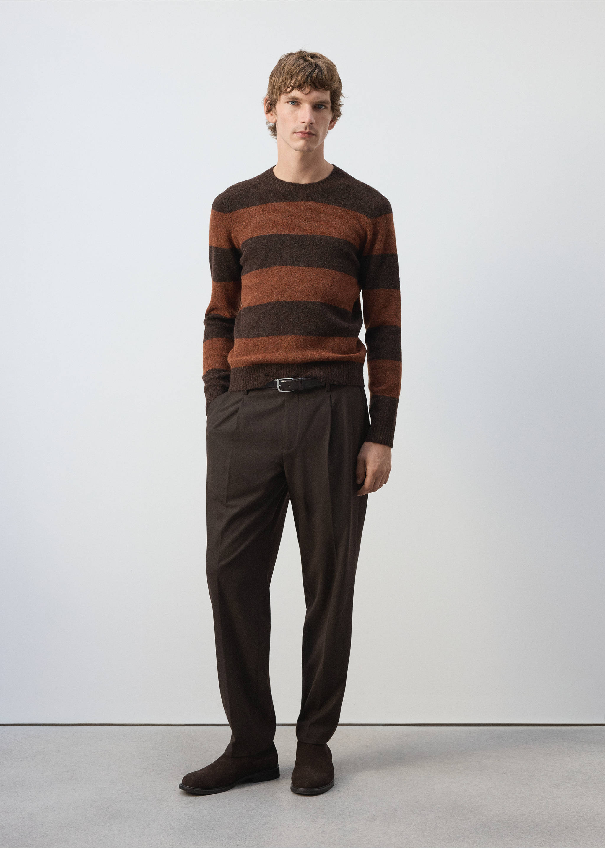 Brown and rust orange striped crew neck jersey worn with brown trousers., Burnt Orange. Ref: 37047917-00.