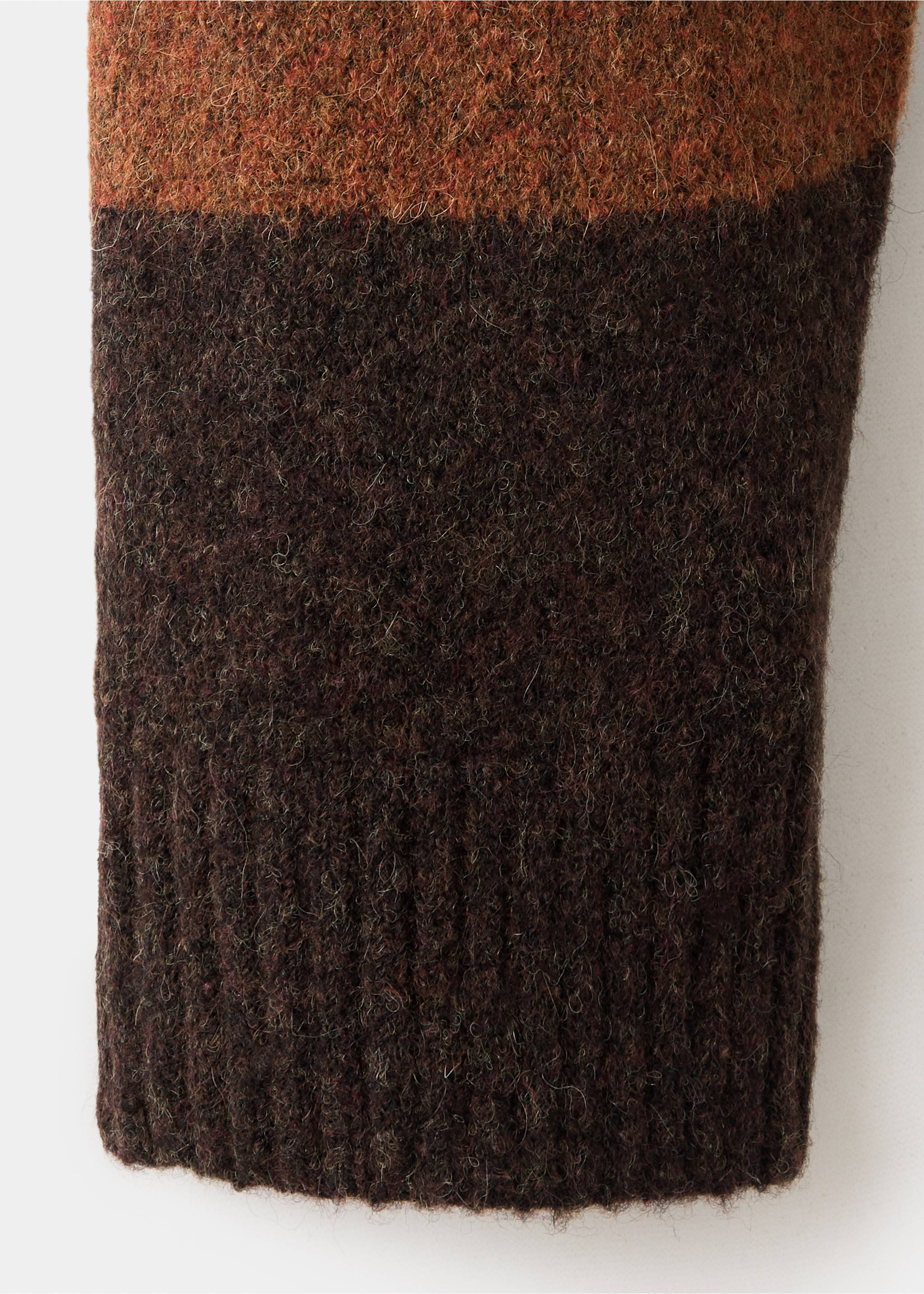 Close-up of a men's chunky knit jersey showing orange and dark brown color-blocking., Burnt Orange. Ref: 37047917-00.