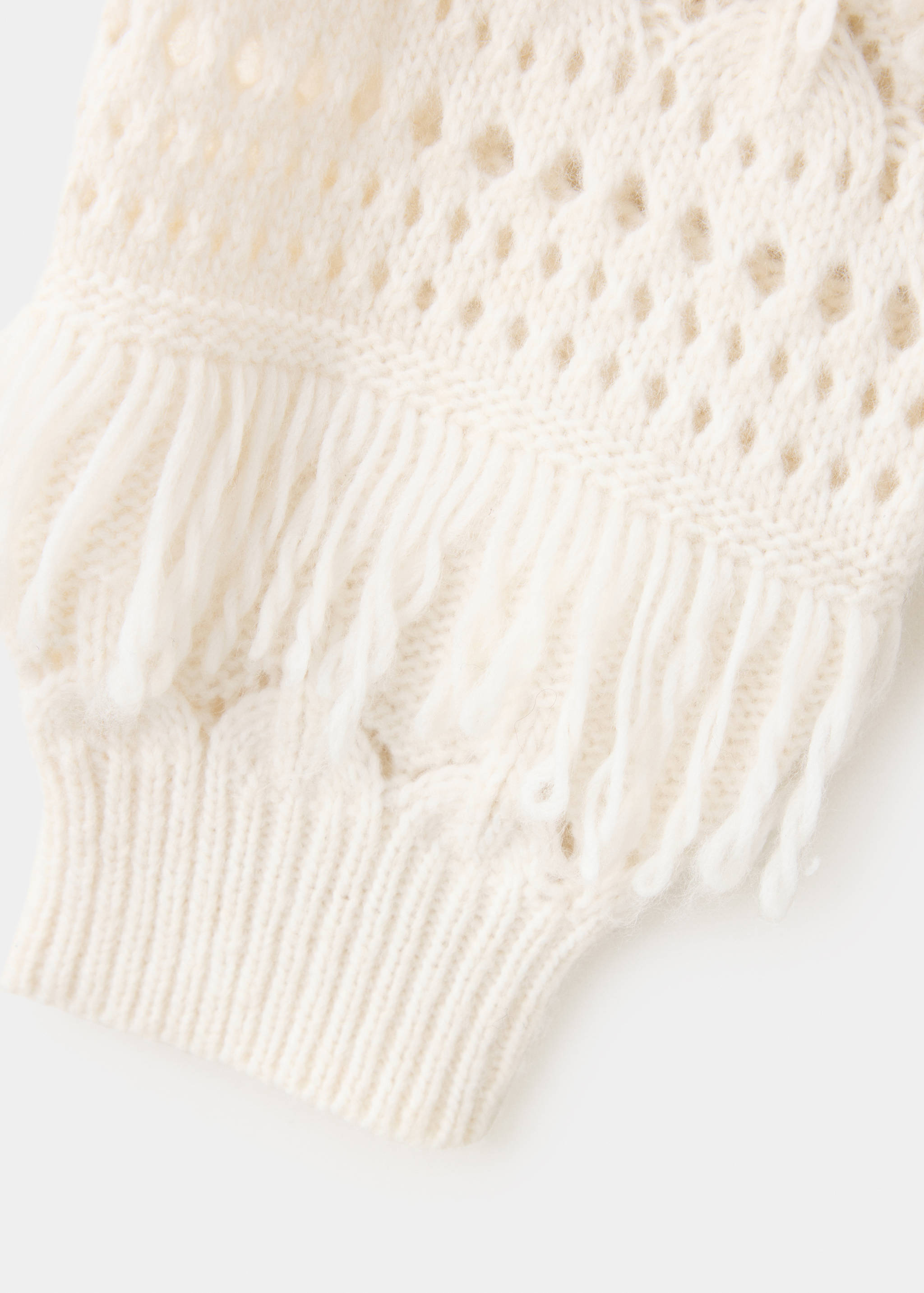 Openwork knitted sweater with fringes - Details of the article 0