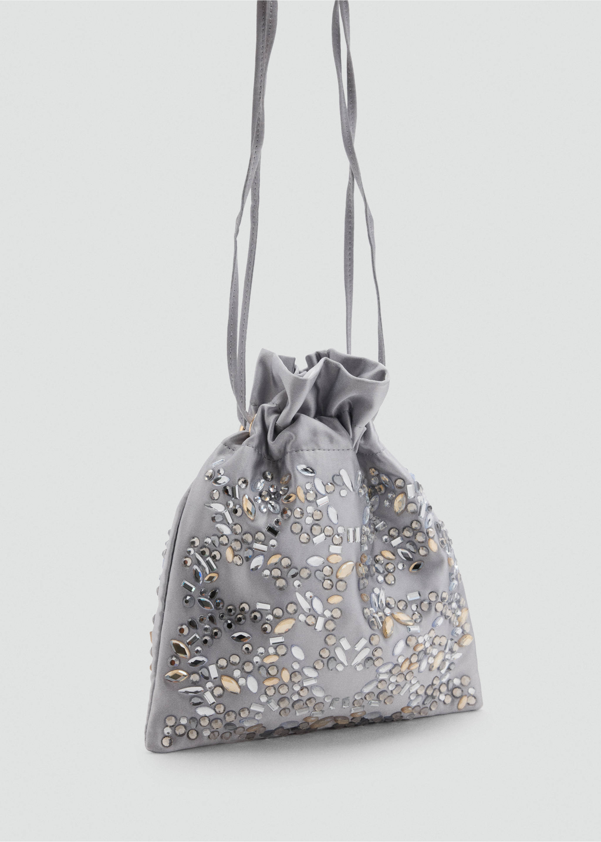 Grey satin drawstring handbag embellished with crystal and rhinestone beading in a three-quarter view., Light/Pastel Grey. Ref: 37047924-00.