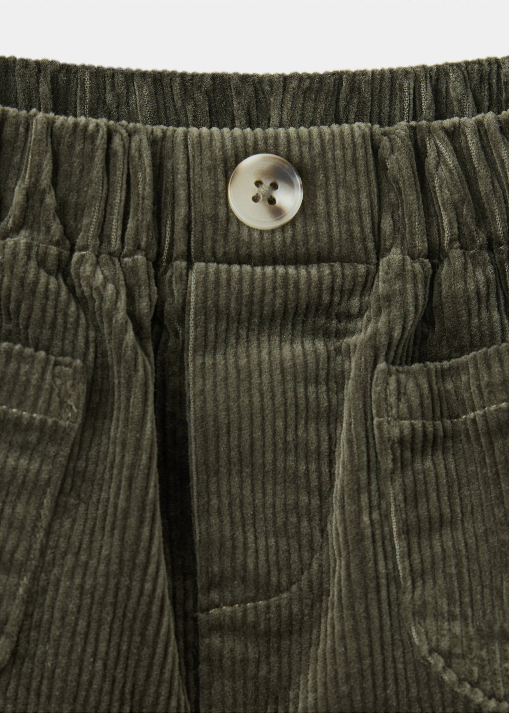 Olive green corduroy trousers detail with an elasticated waistband and patch pockets, Dark Green. Ref: 37047927-00.