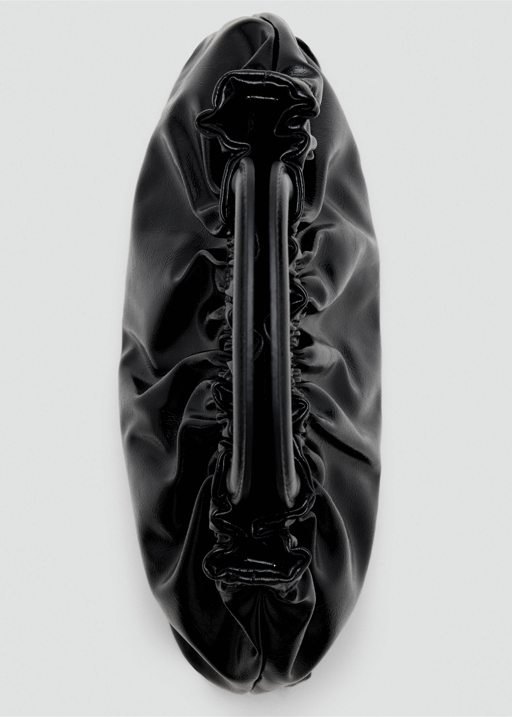 Close-up of a black glossy mini bag with gathered pleats and tubular handles., Black. Ref: 37047931-00.