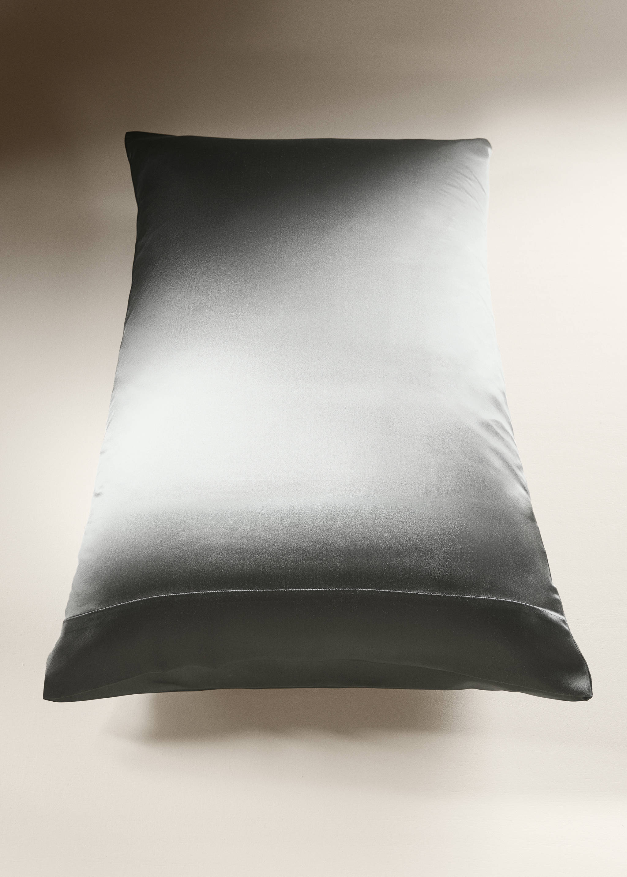 Silky gradient pillowcase in dark grey and silver.