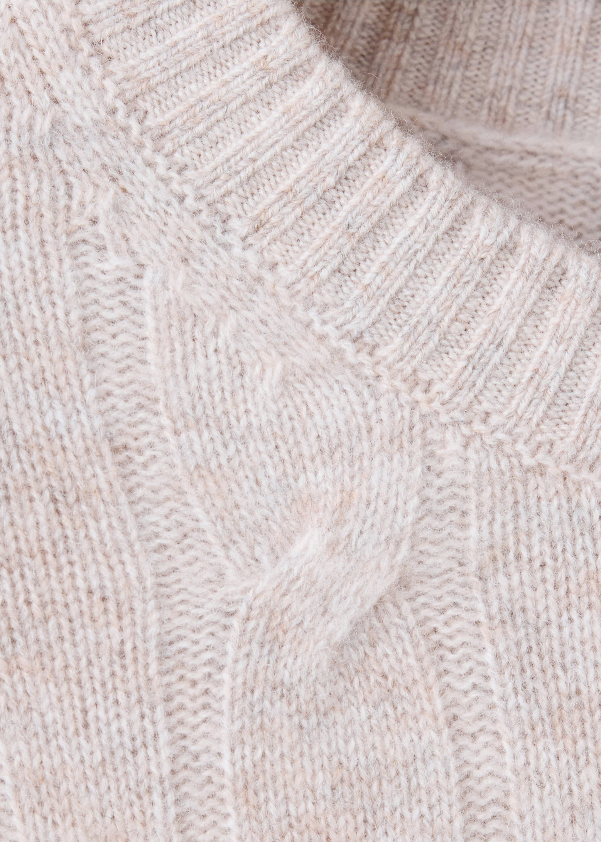 Close-up of a light beige marled men's jumper showing the crew neckline and cable-knit texture., Beige. Ref: 37048275-00.