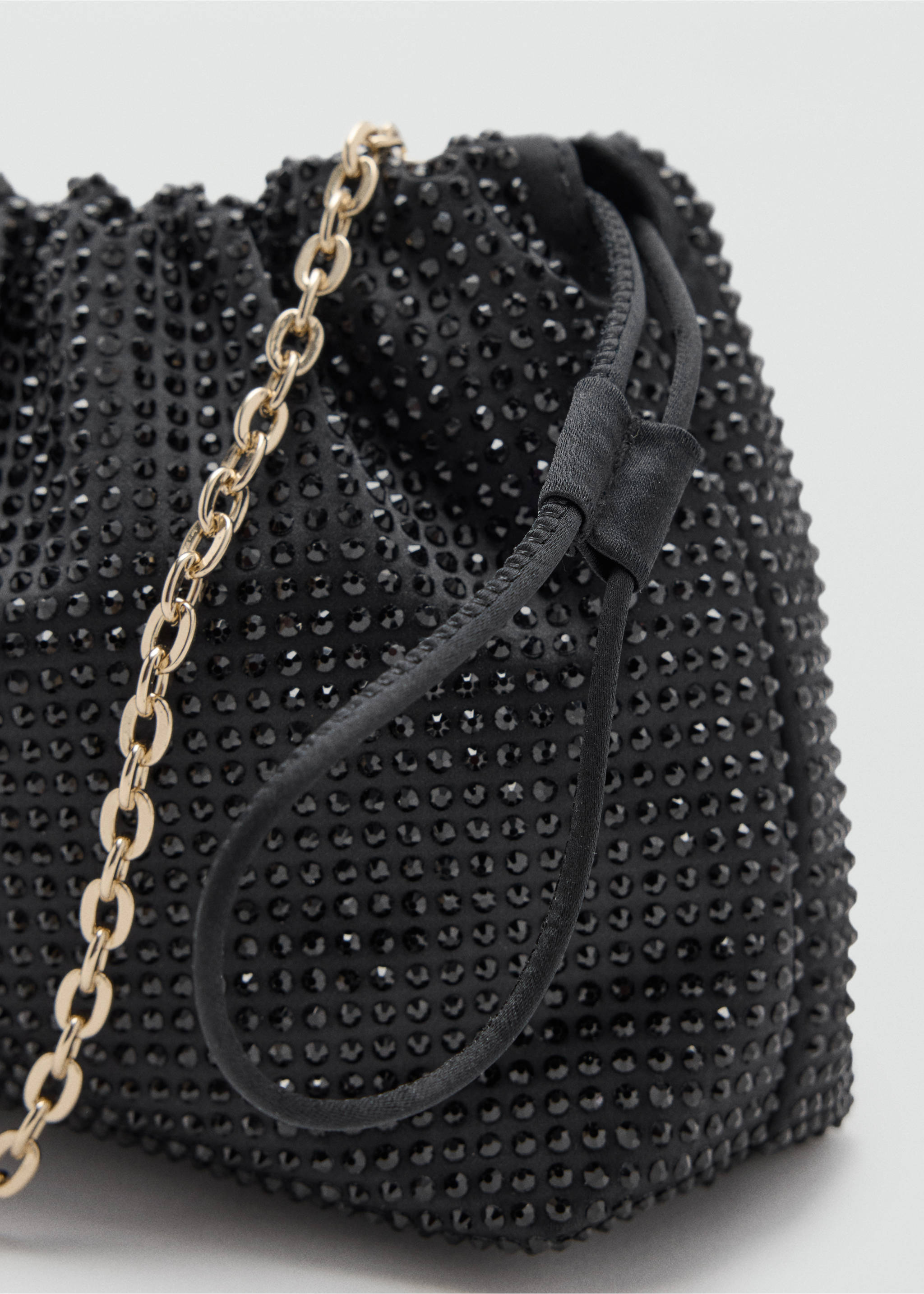 Black rhinestone shoulder bag detail with drawstring and gold chain., Black. Ref: 37048279-00.