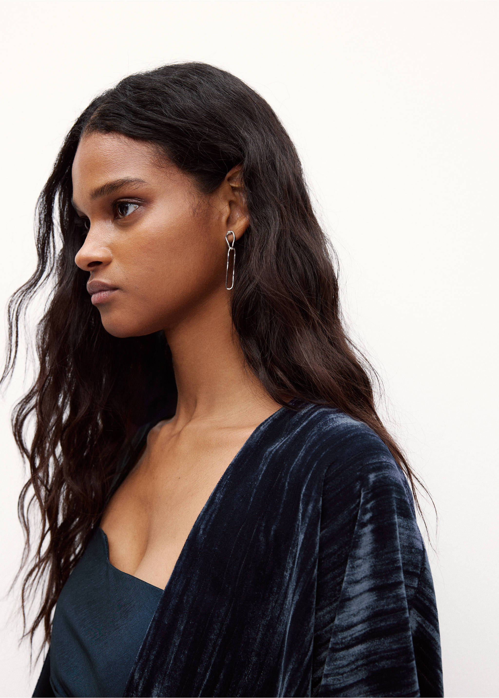 Close-up of a dark blue velvet blazer with silver drop earrings., Navy. Ref: 37048280-00.