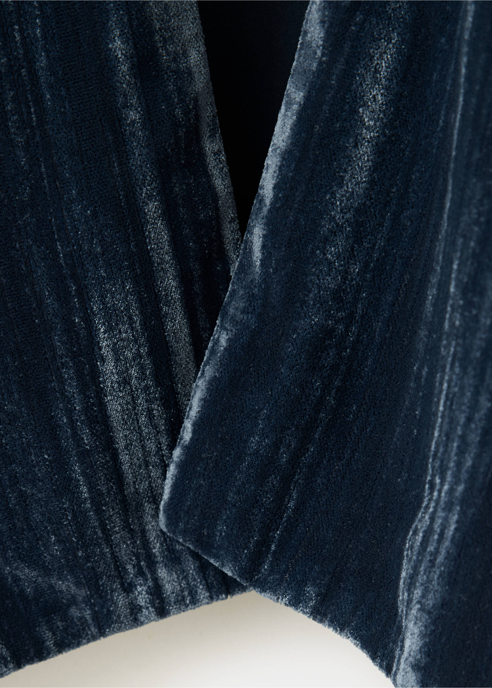 Close-up of a dark blue velvet blazer showing the textured fabric and lapel., Navy. Ref: 37048280-00.