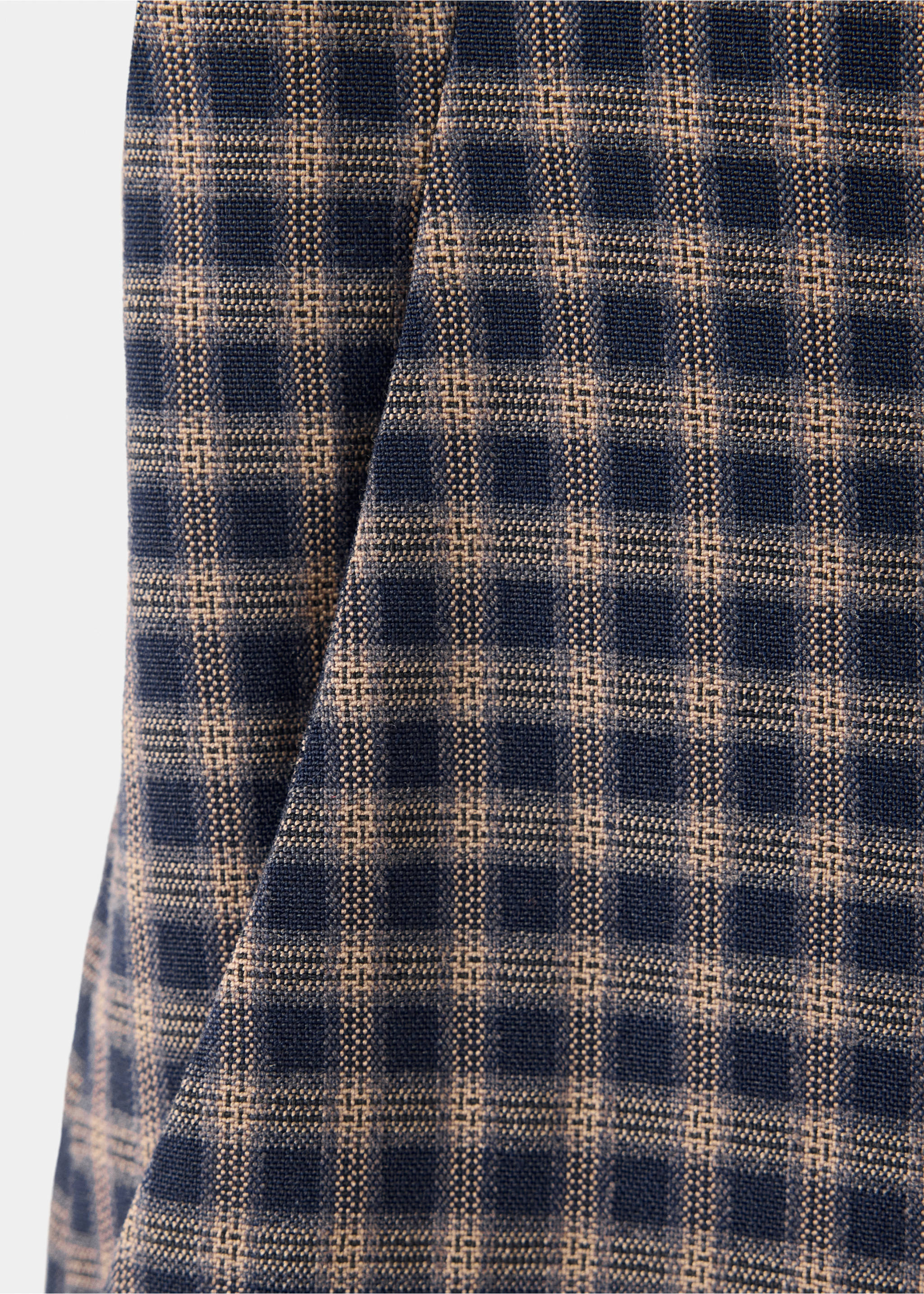 Close-up of children's trousers in a dark blue and brown check fabric., Navy. Ref: 37048286-00.