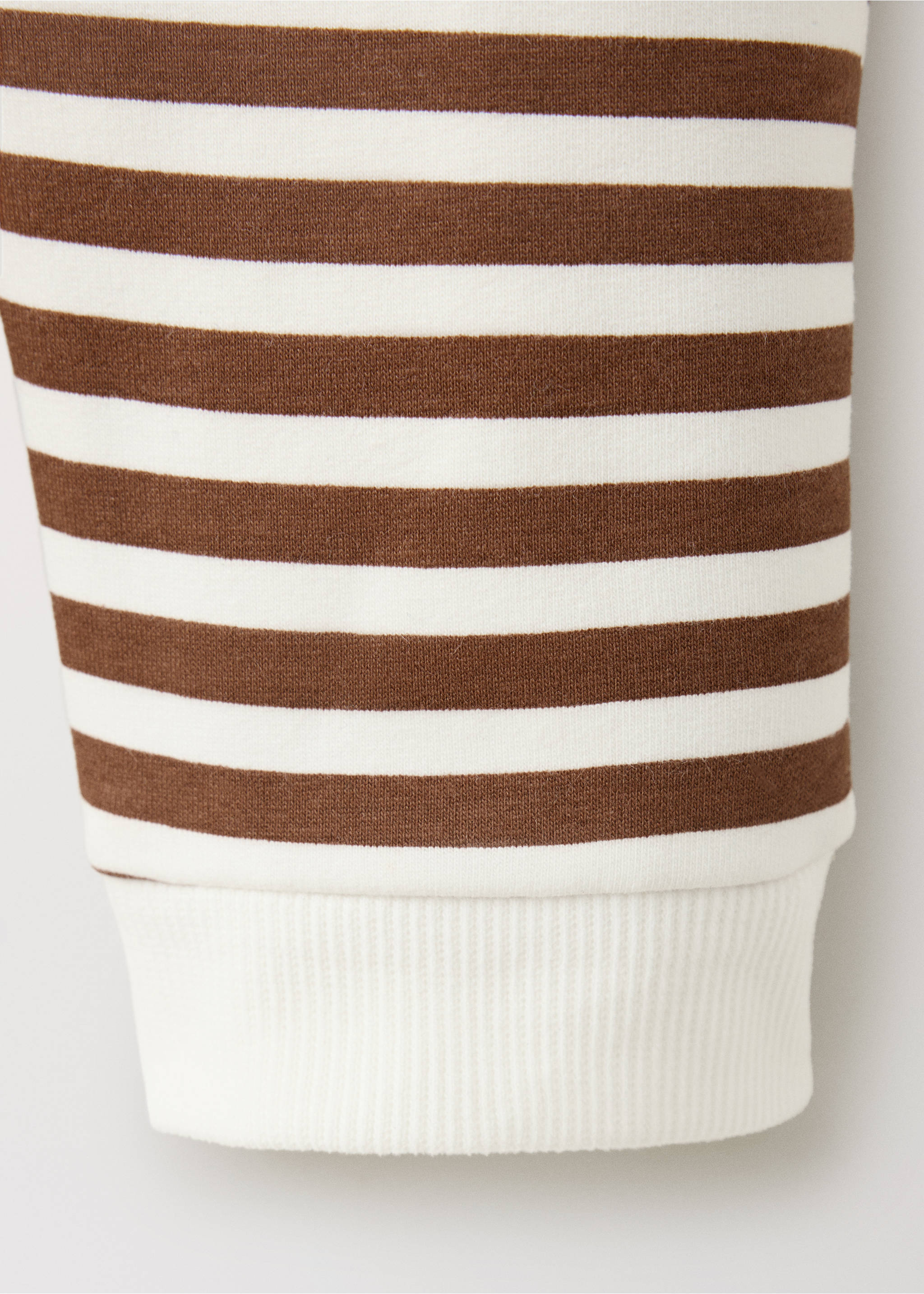 Brown and white striped pyjama jumpsuit cuff detail., Red. Ref: 37048638-00.