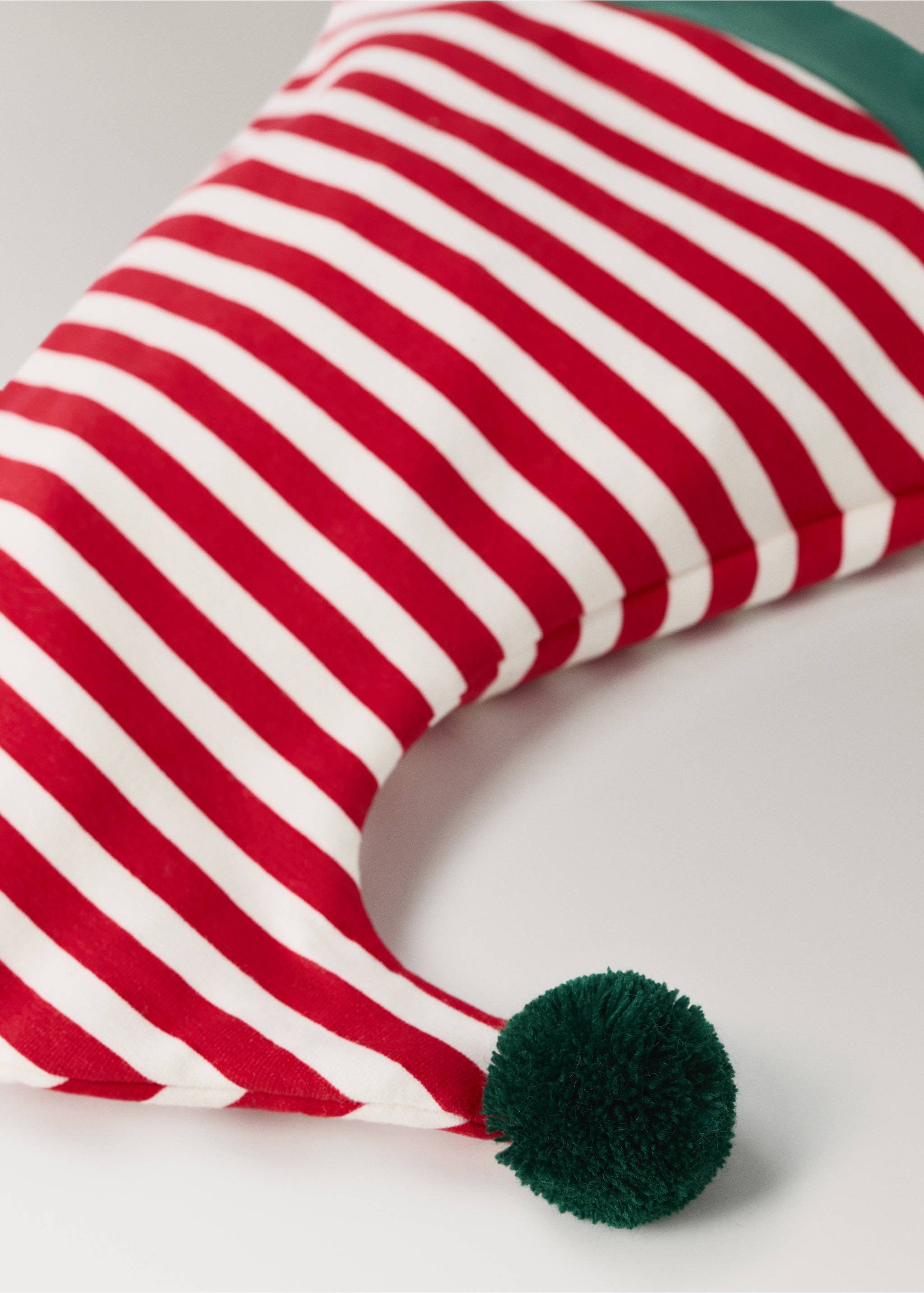 Red and white striped hat with green cuff and pom-pom detail., Red. Ref: 37048639-00.