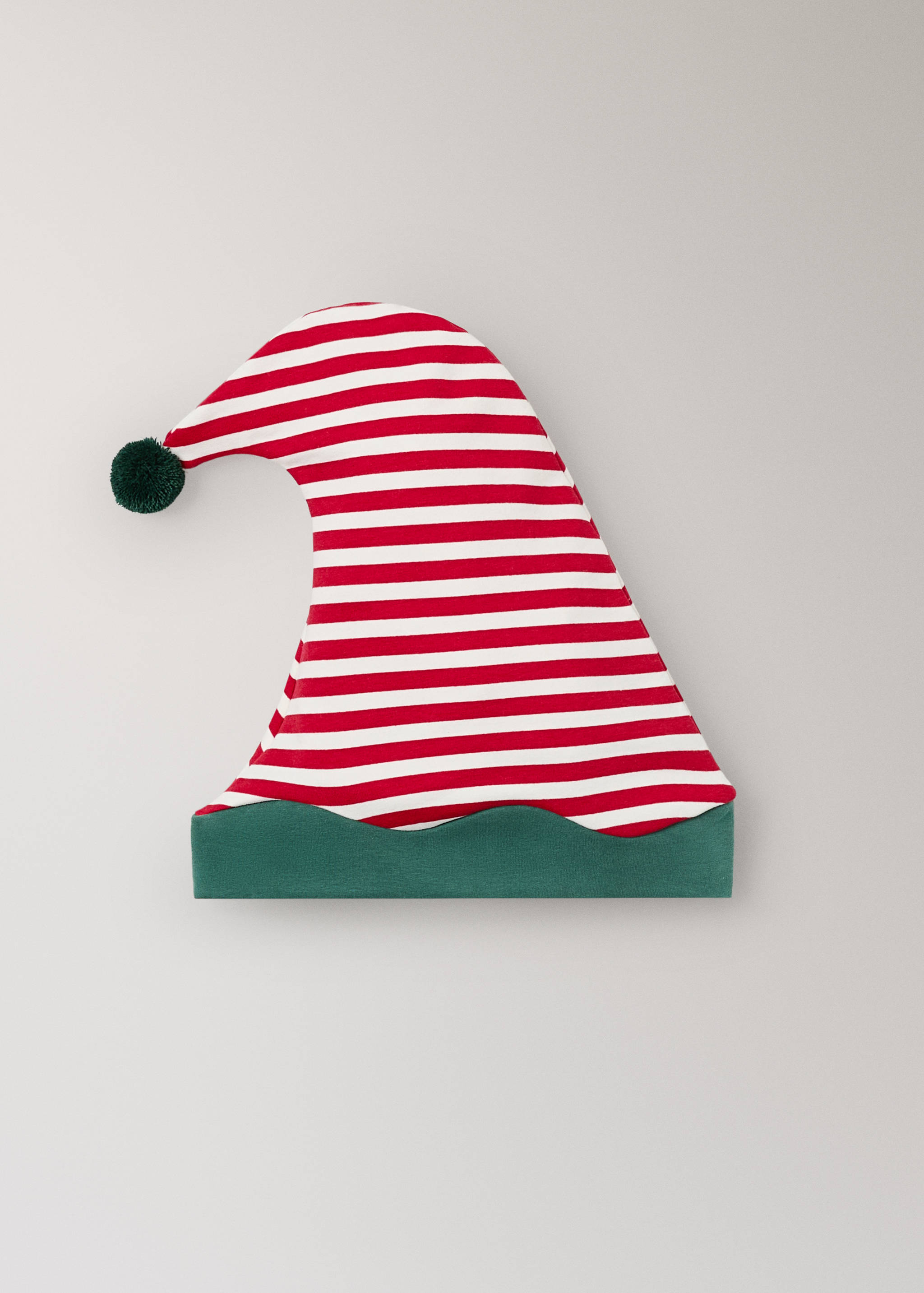 Red and white striped hat with a scalloped green brim and pom-pom tip.