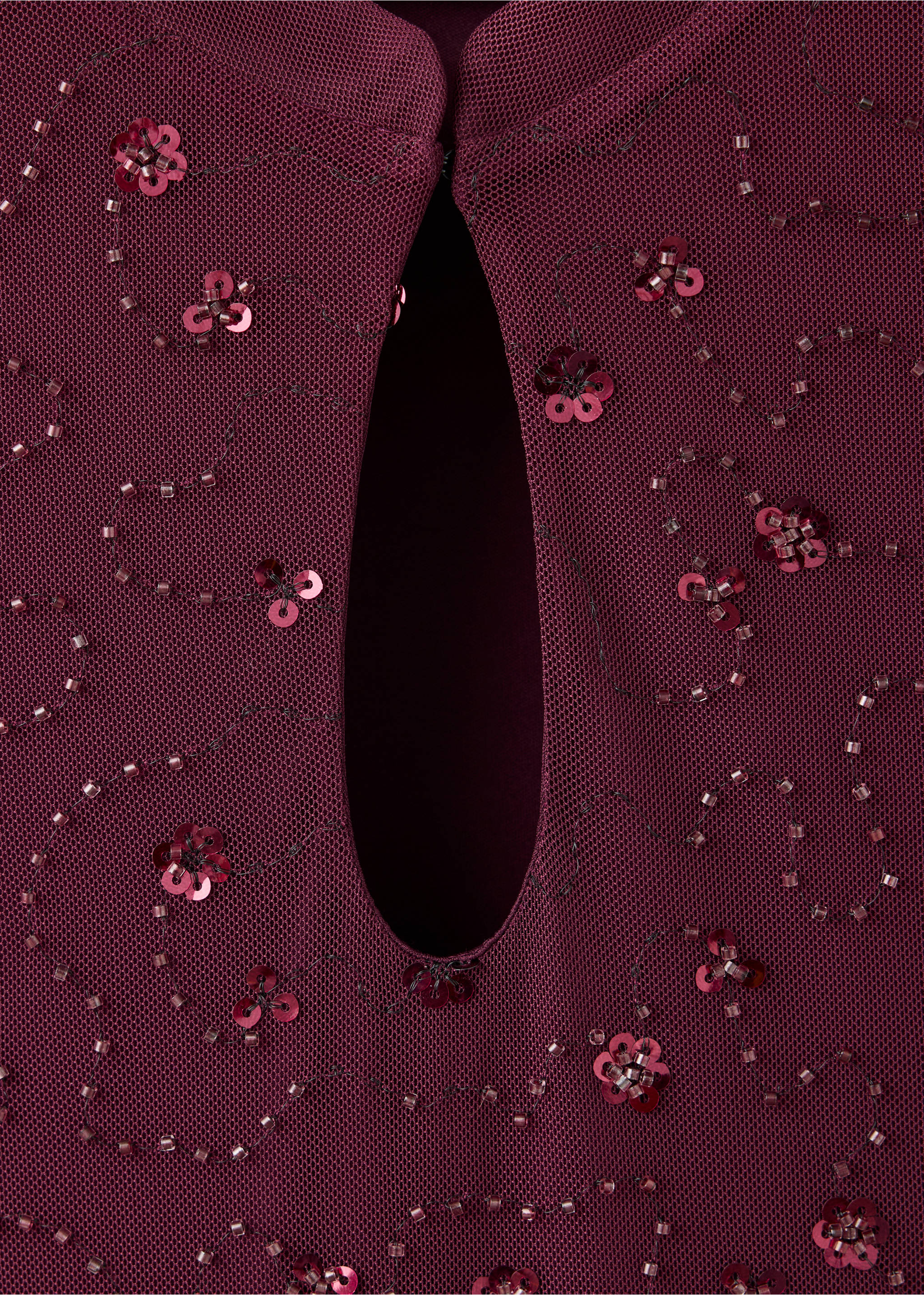 Close-up of a maroon dress bodice with keyhole neckline and sequin floral embroidery., Burgundy. Ref: 37049126-00.