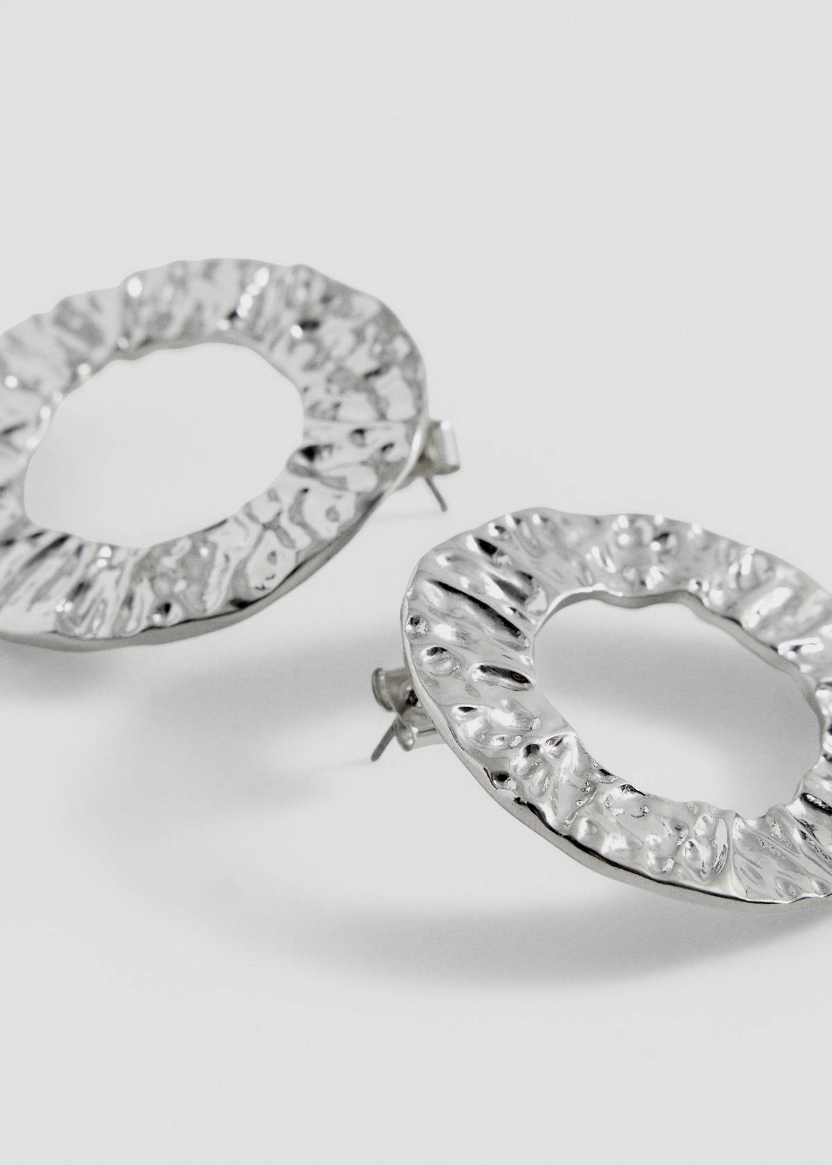Textured hoop earrings — Silver