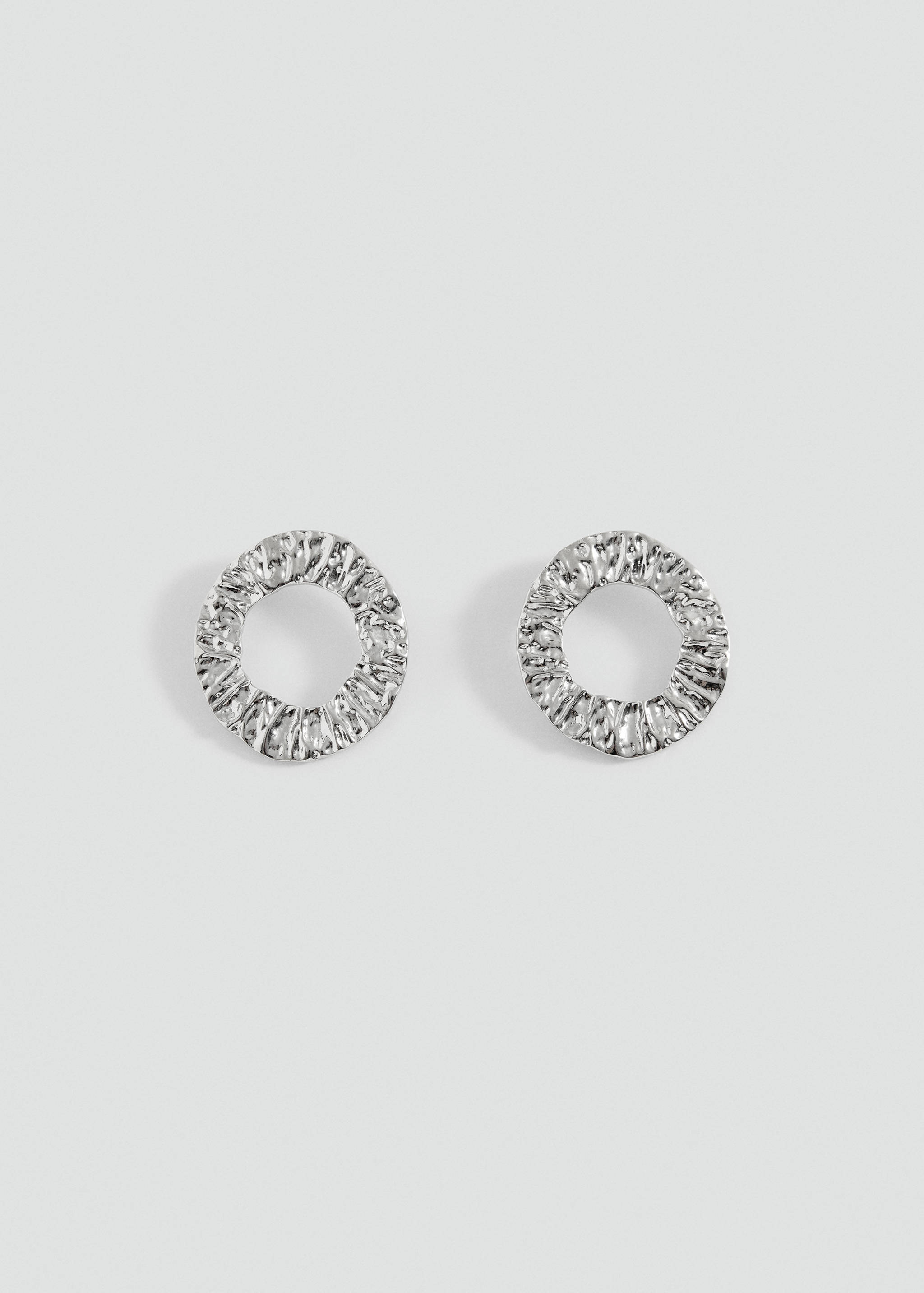 Silver-toned textured hoop earrings.
