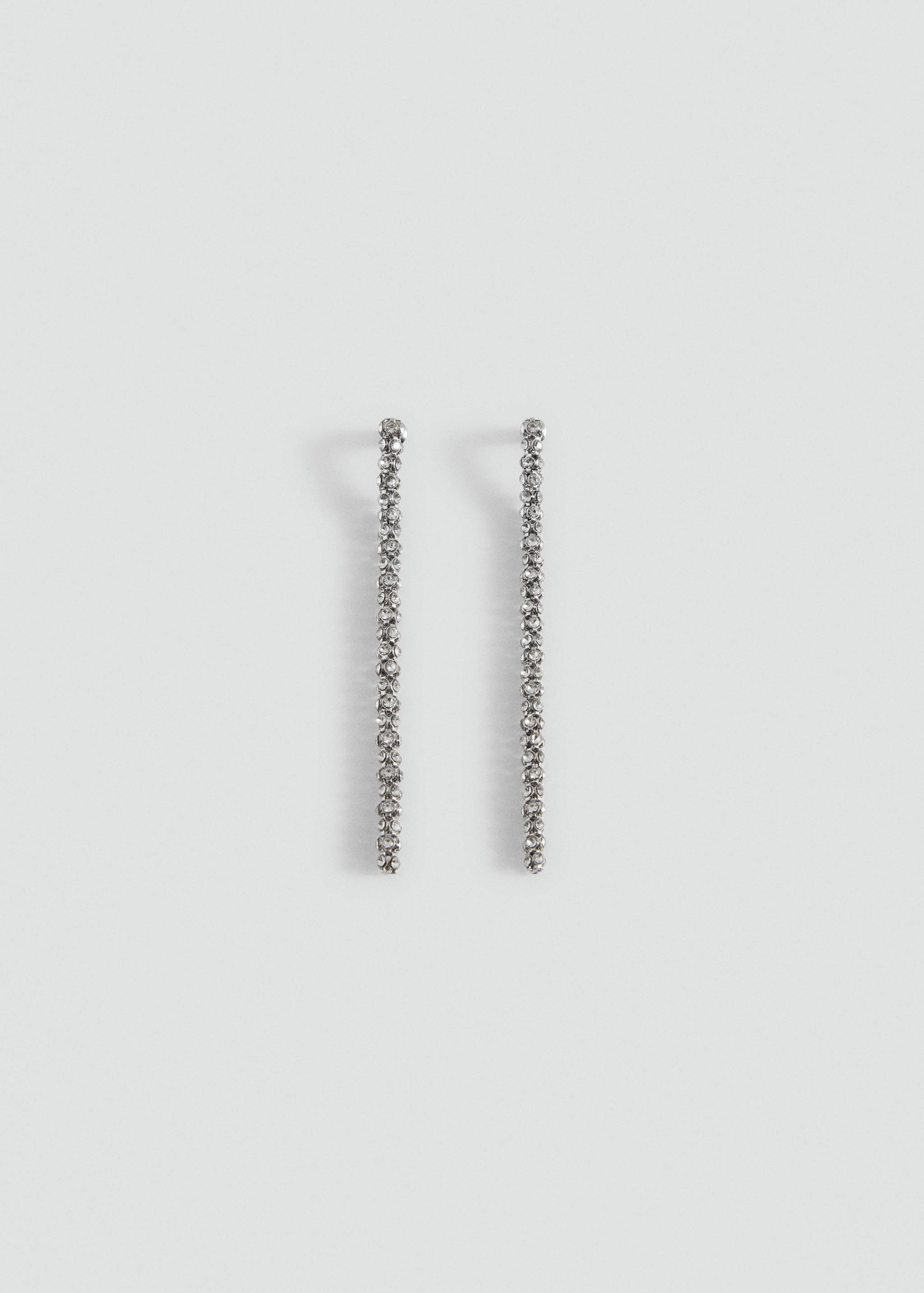 Silver rhinestone-encrusted long drop earrings.