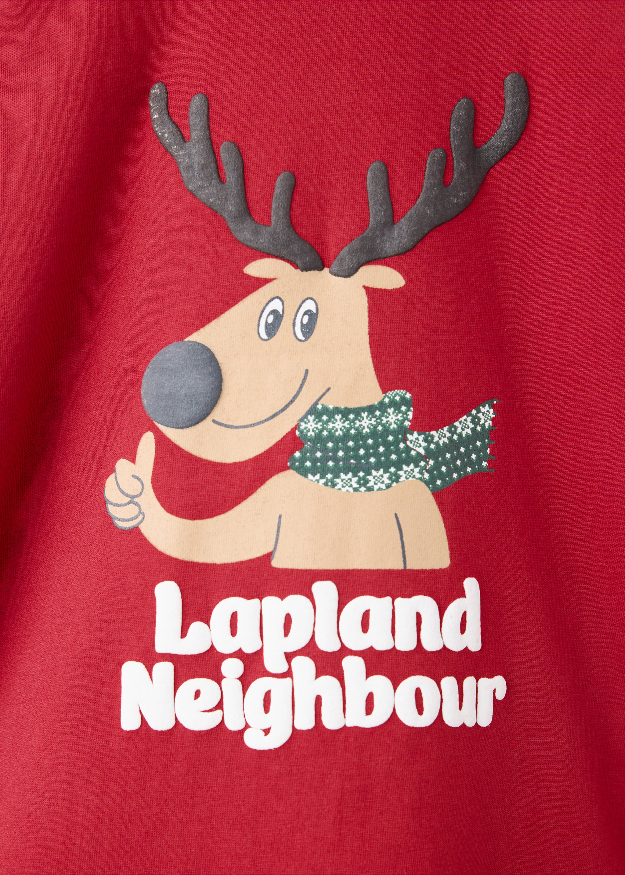 Red t-shirt detail with a reindeer graphic and Lapland Neighbour text., Medium Red. Ref: 37049209-00.