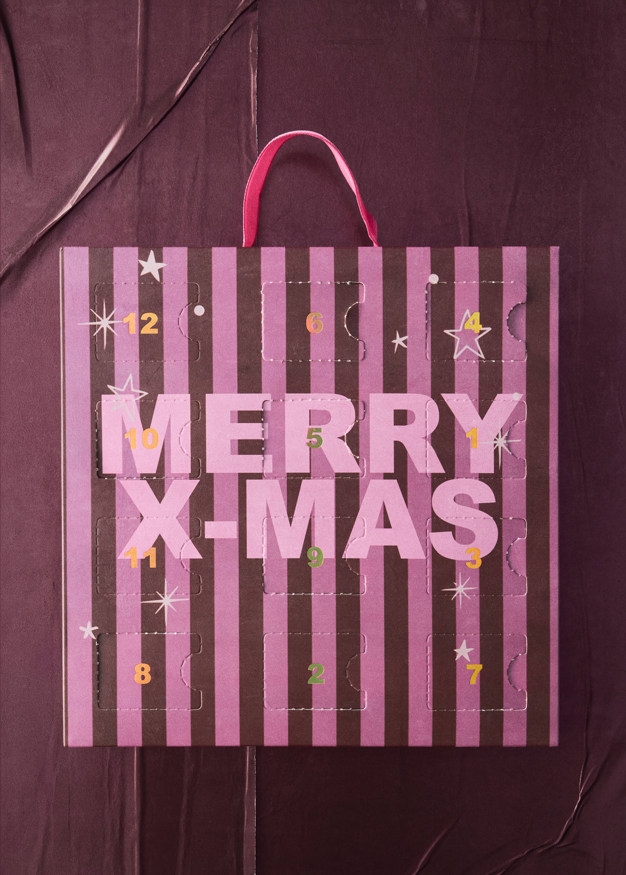Purple and brown striped advent calendar bag with MERRY X-MAS text.
