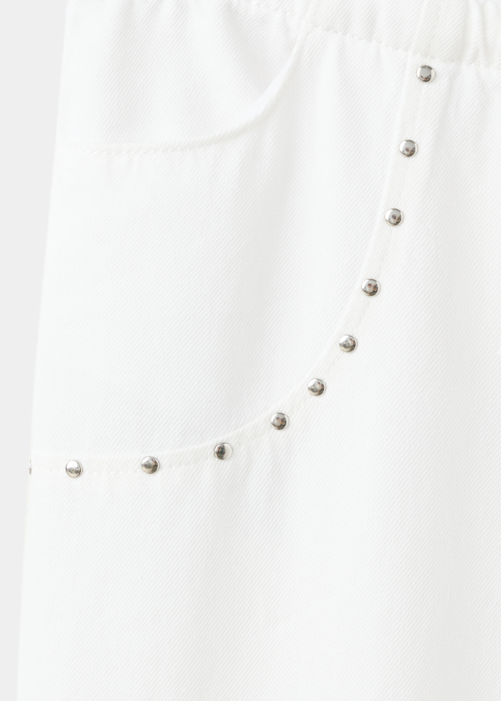 Studded long trousers - Details of the article 8