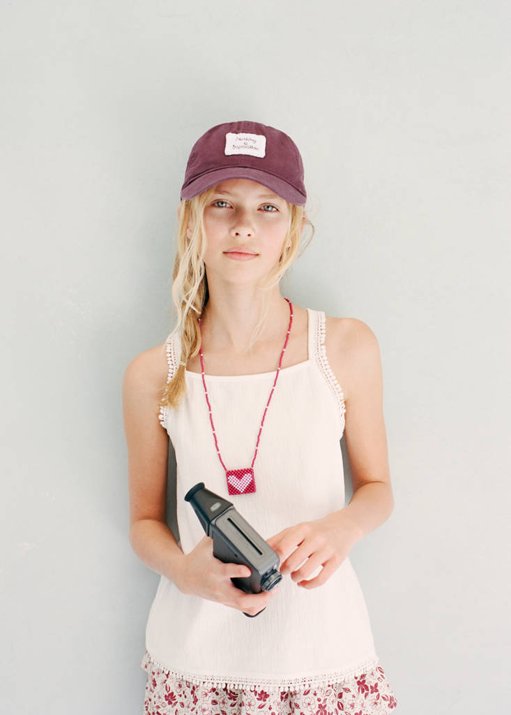 Sleeveless vest with embroidered details — Off White