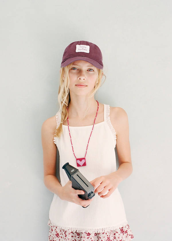 Sleeveless vest with embroidered details — Off White