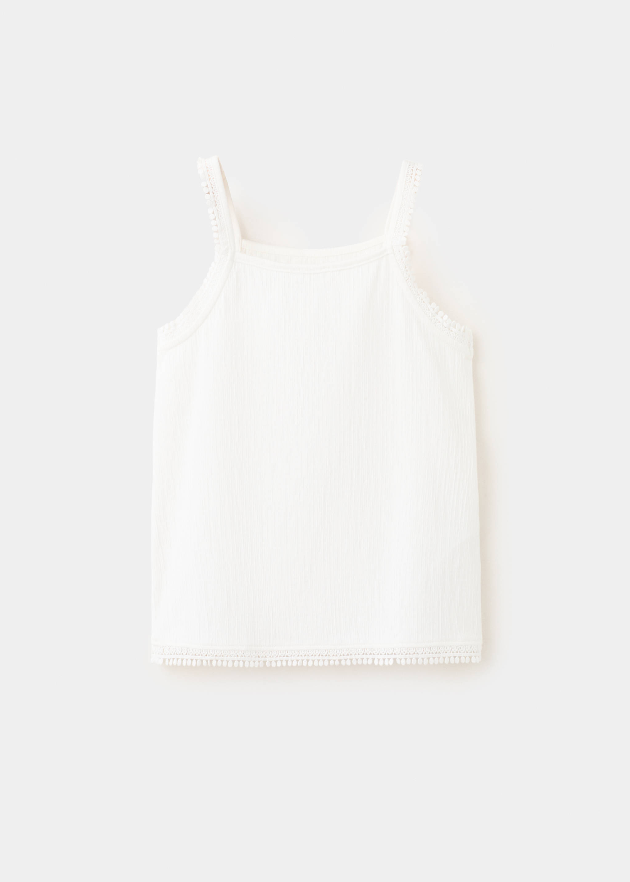 Sleeveless vest with embroidered details - Reverse of the article