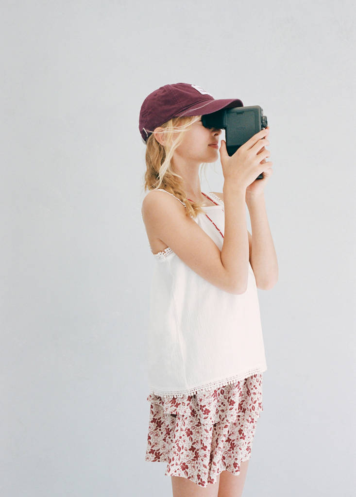 Sleeveless vest with embroidered details — Off White