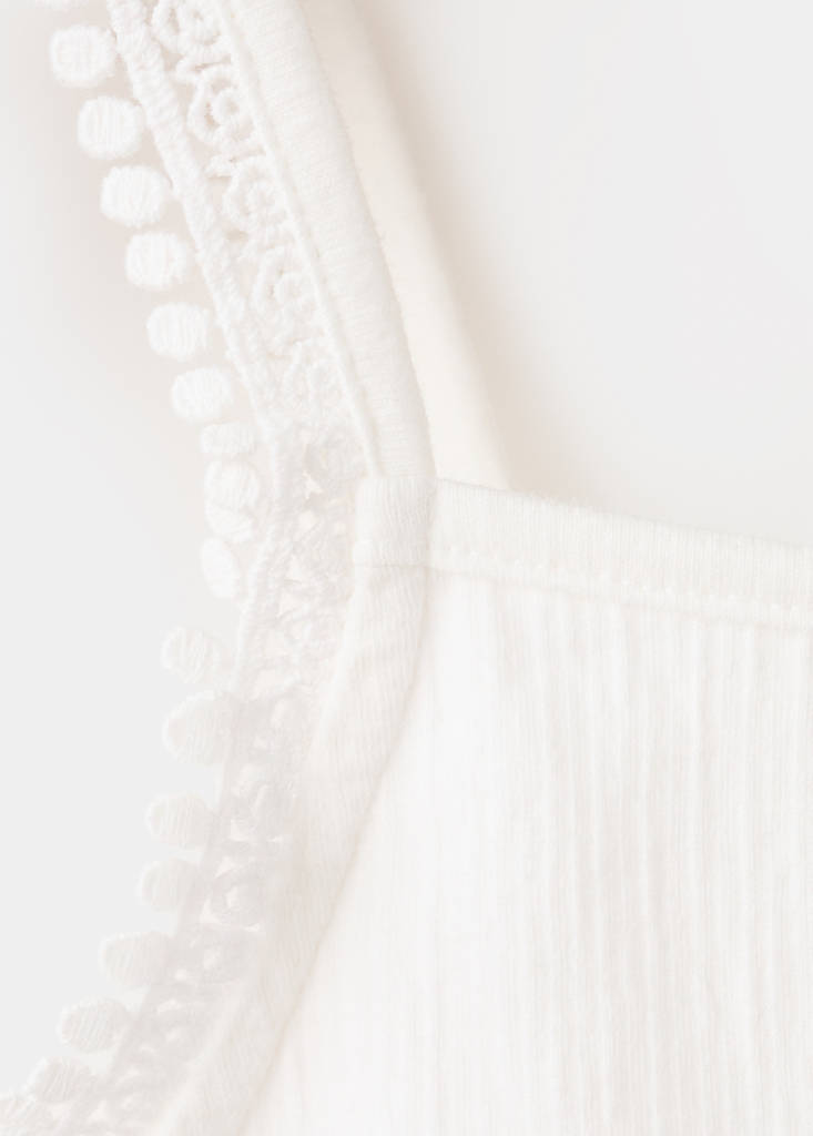 Sleeveless vest with embroidered details — Off White