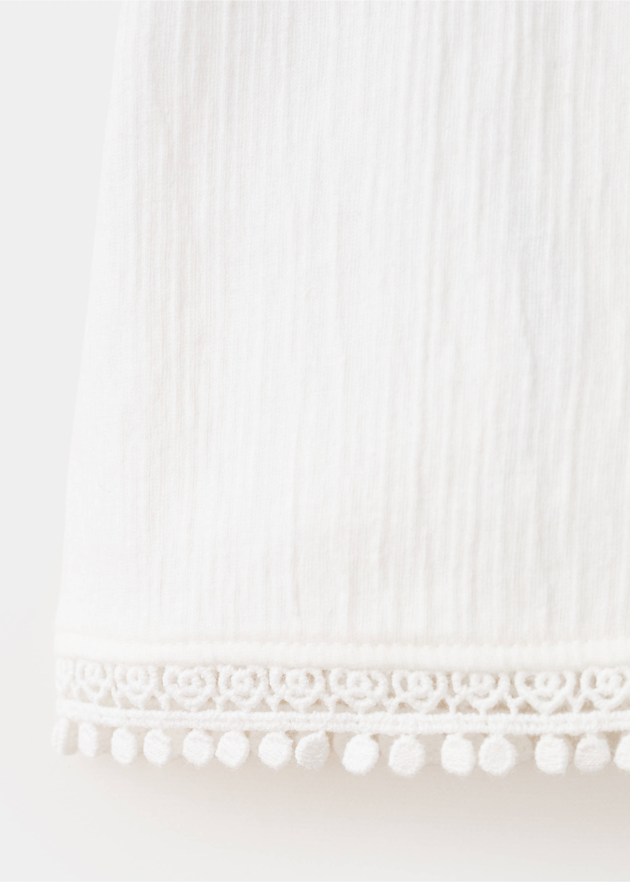 Sleeveless vest with embroidered details - Details of the article 0, Off White. Ref: 37051355-00.