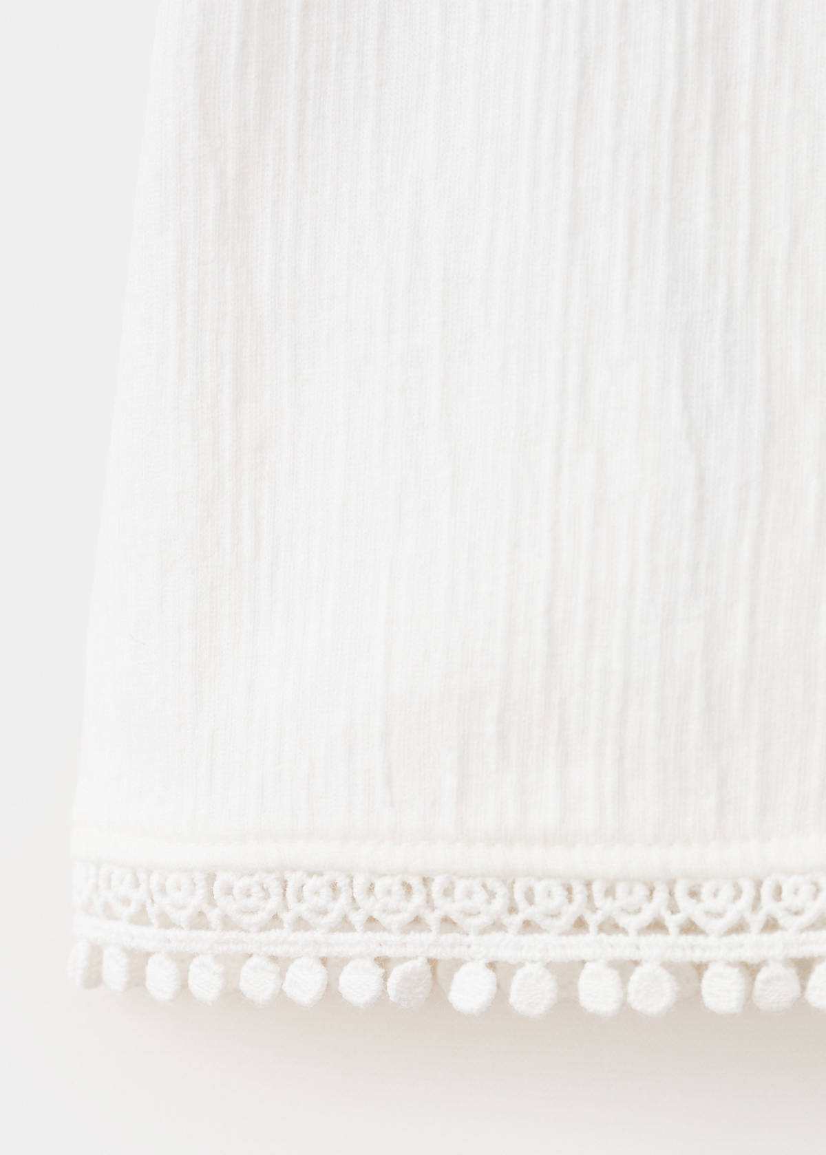 Sleeveless vest with embroidered details — Off White