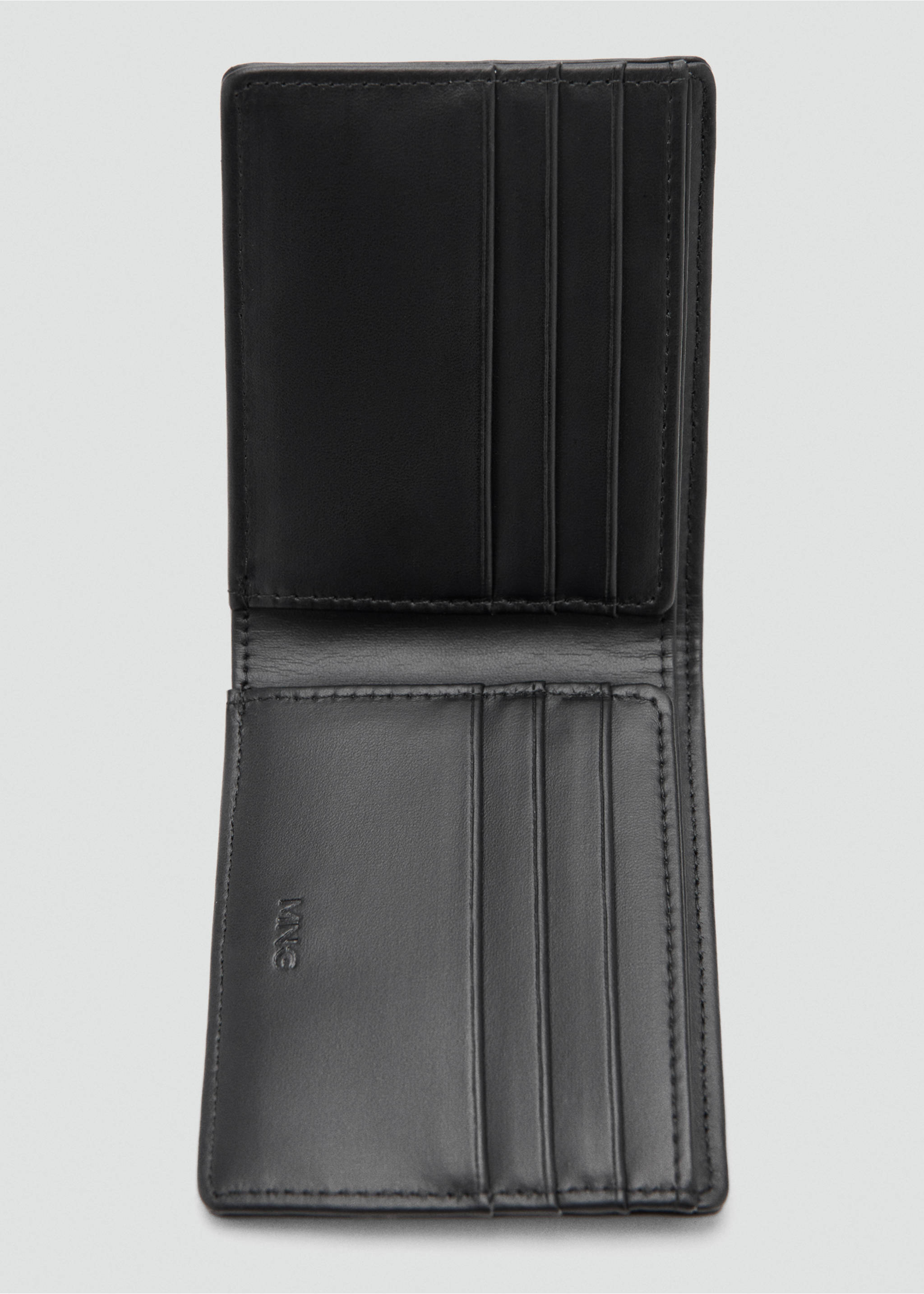 Wallet with embossed effect - Details of the article 1, Black. Ref: 37051394-00.