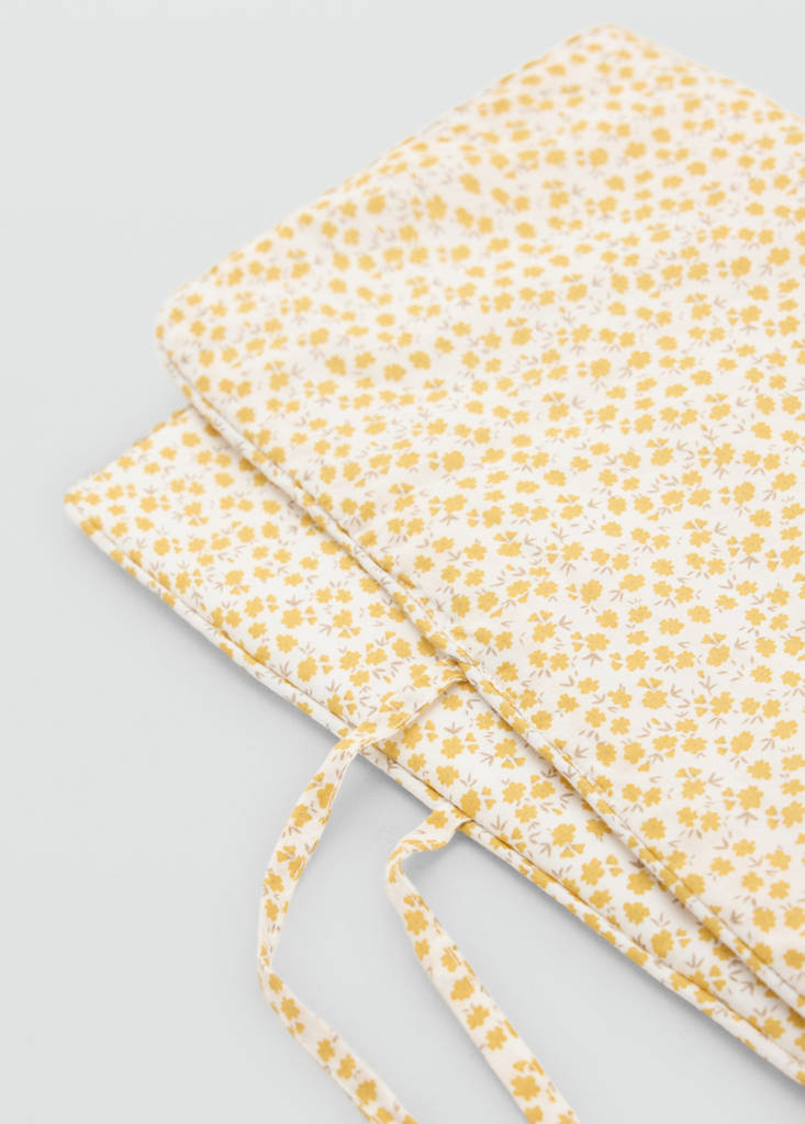 Floral travel changing mat — Yellow