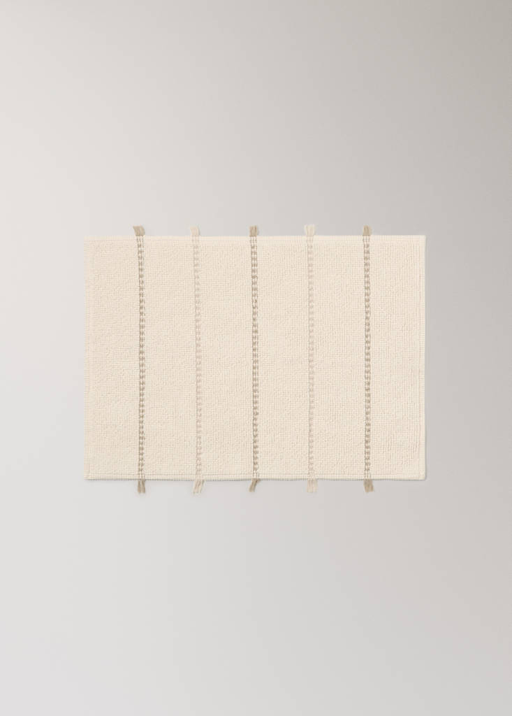 Striped bath mat with fringe detail — Ecru