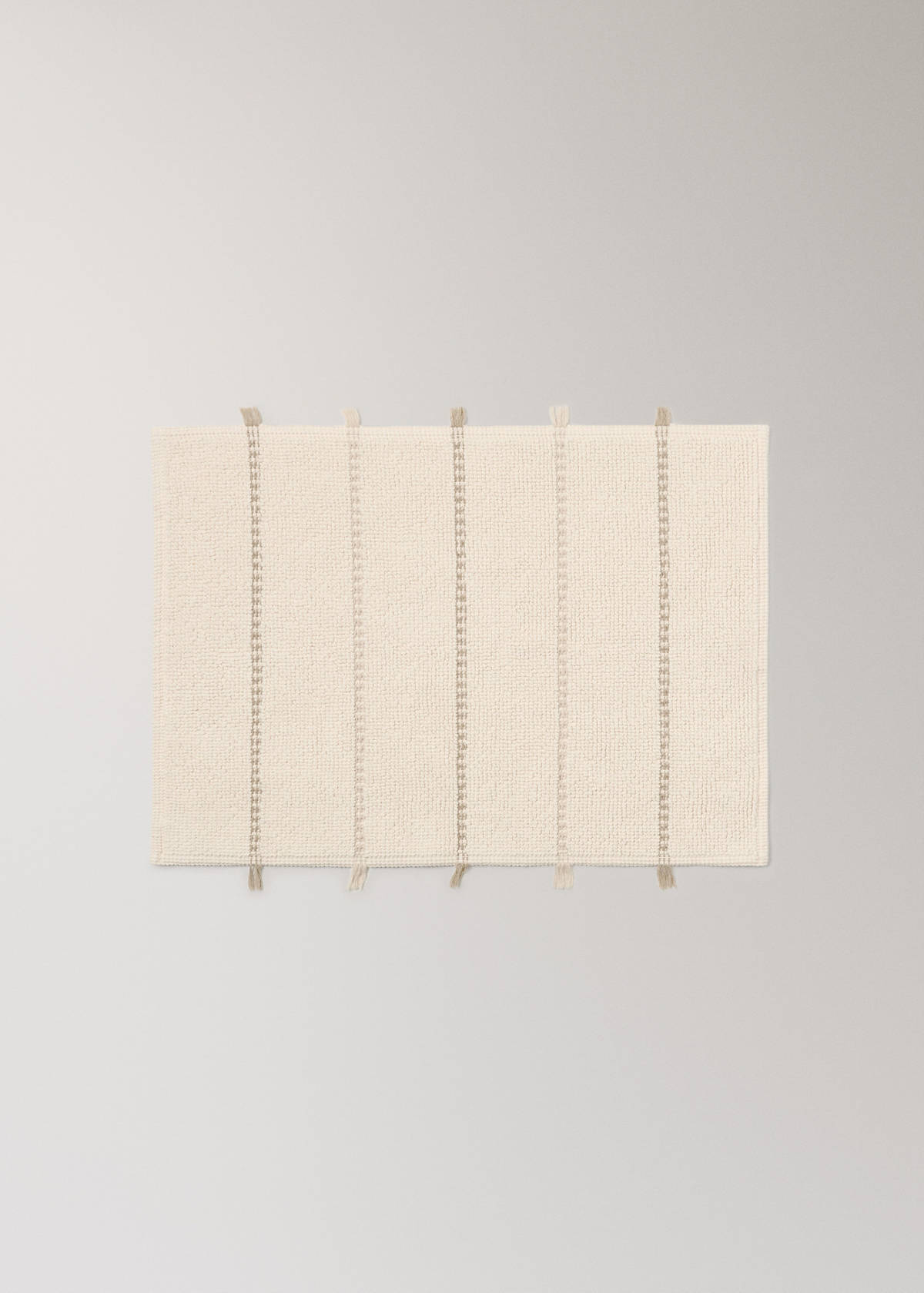 Striped bath mat with fringe detail — Ecru