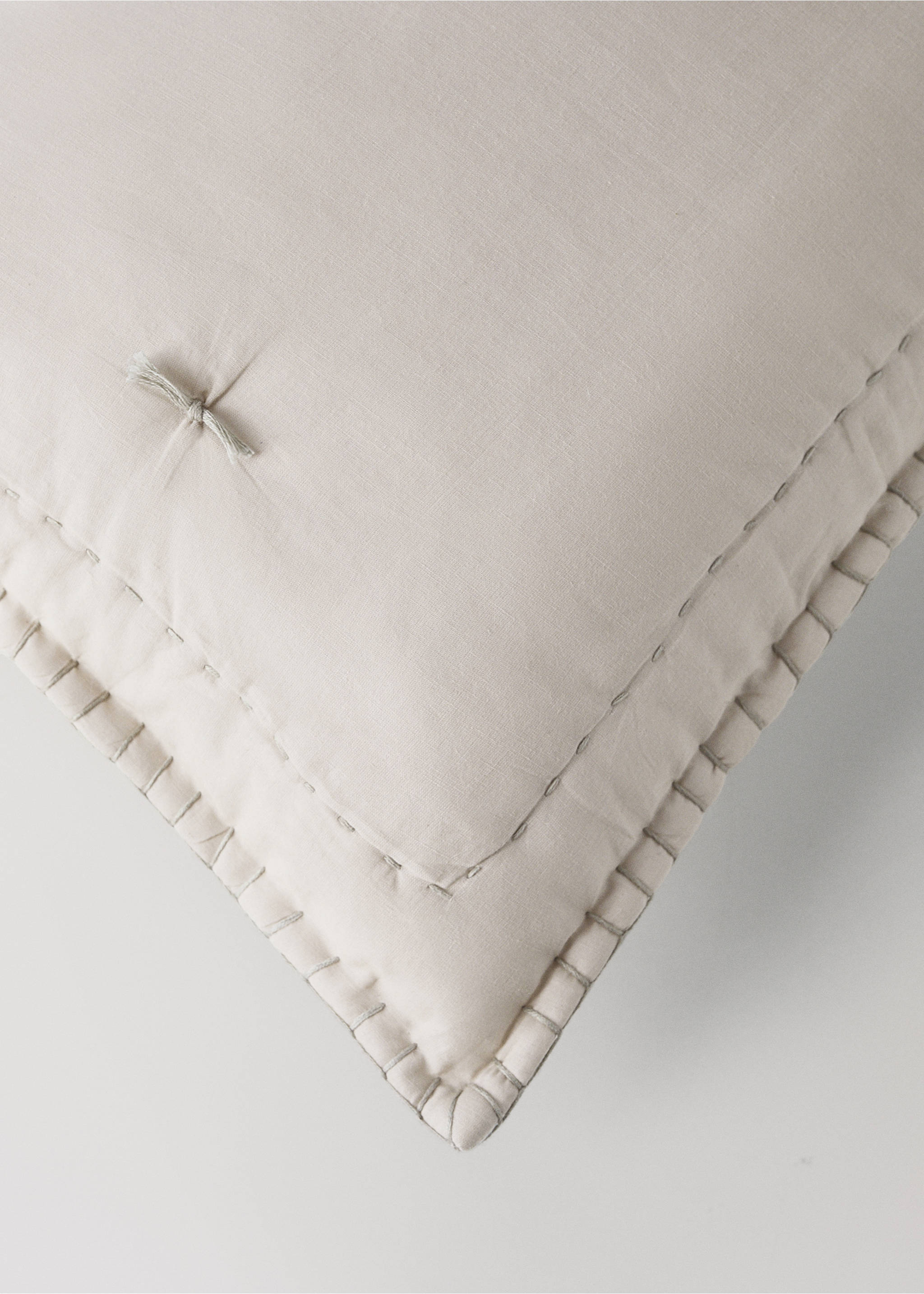 Beige cushion cover detail with decorative stitching, Grey. Ref: 37051549-00.