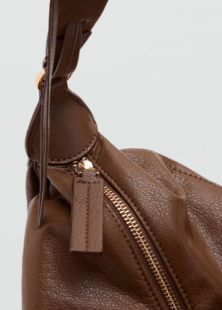 Oval shoulder bag — Leather