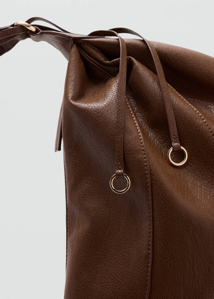 Oval shoulder bag — Leather