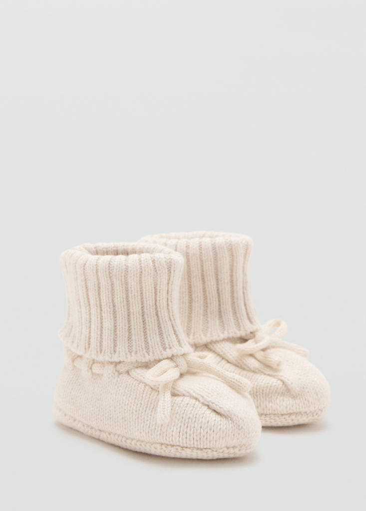 Knitted booties with bow — Sand