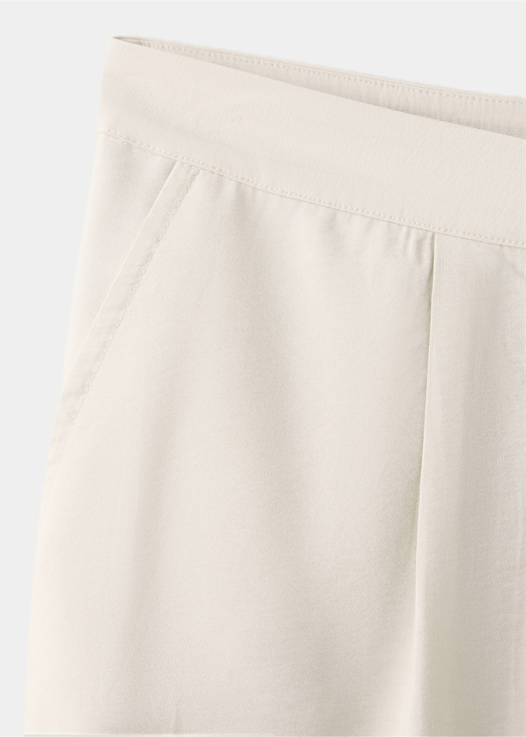 Flowy wide-leg trousers with pleats - Details of the article 8, Beige. Ref: 37053305-00.