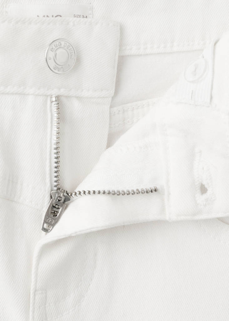 Flared jeans with studs — White