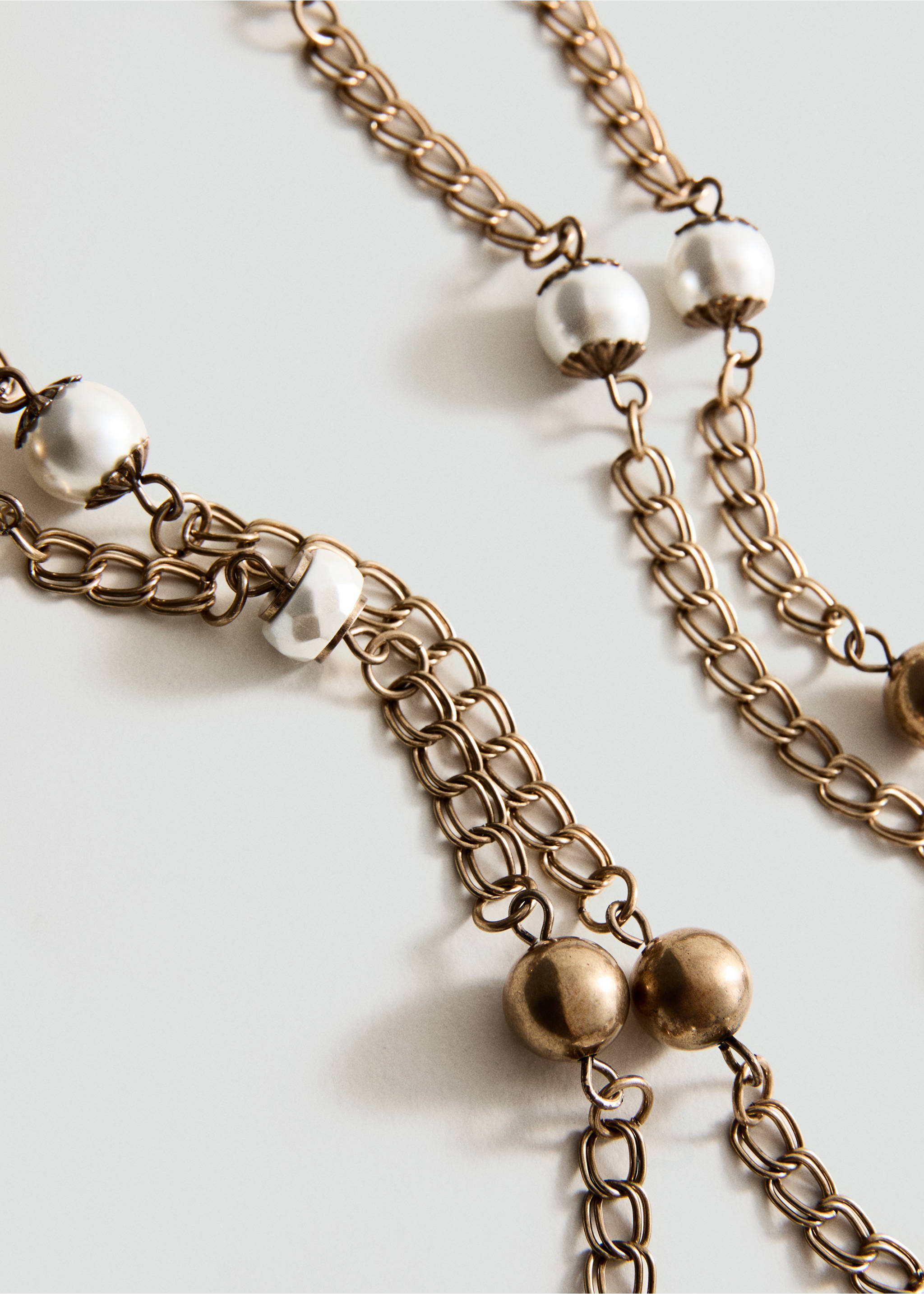 Double necklace with bead detail - Medium plane, Gold. Ref: 37054446-00.