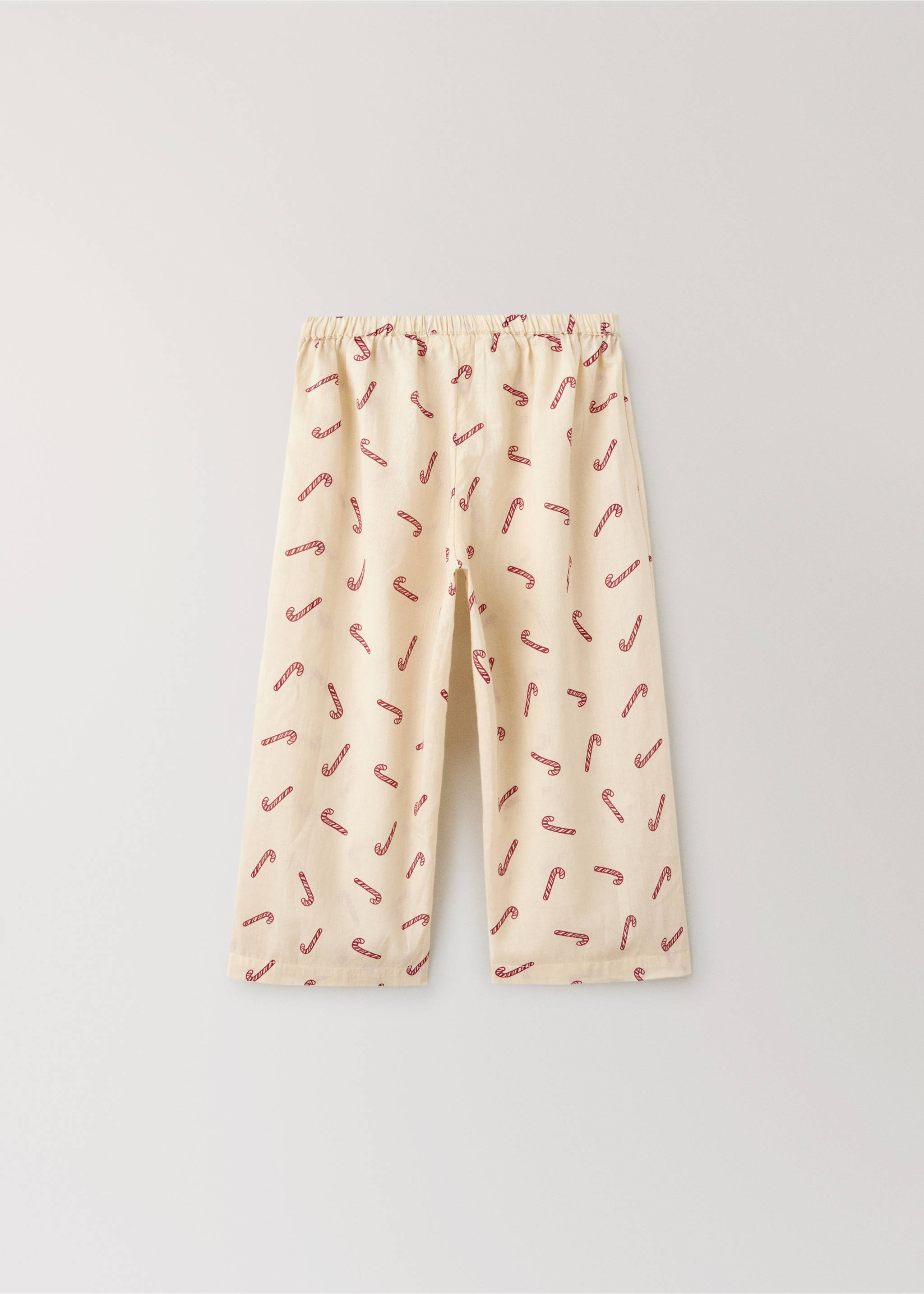 Cream pyjama trousers with a red candy cane print and elasticated waistband., Off White. Ref: 37054452-00.