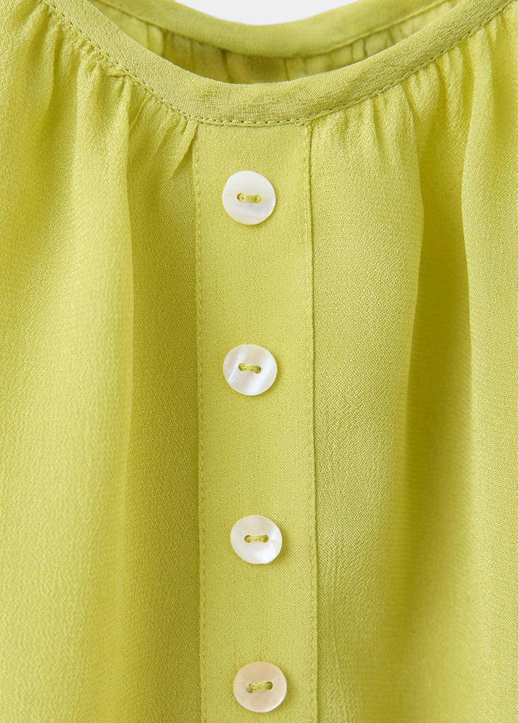 Sleeveless top with decorative buttons — Lime