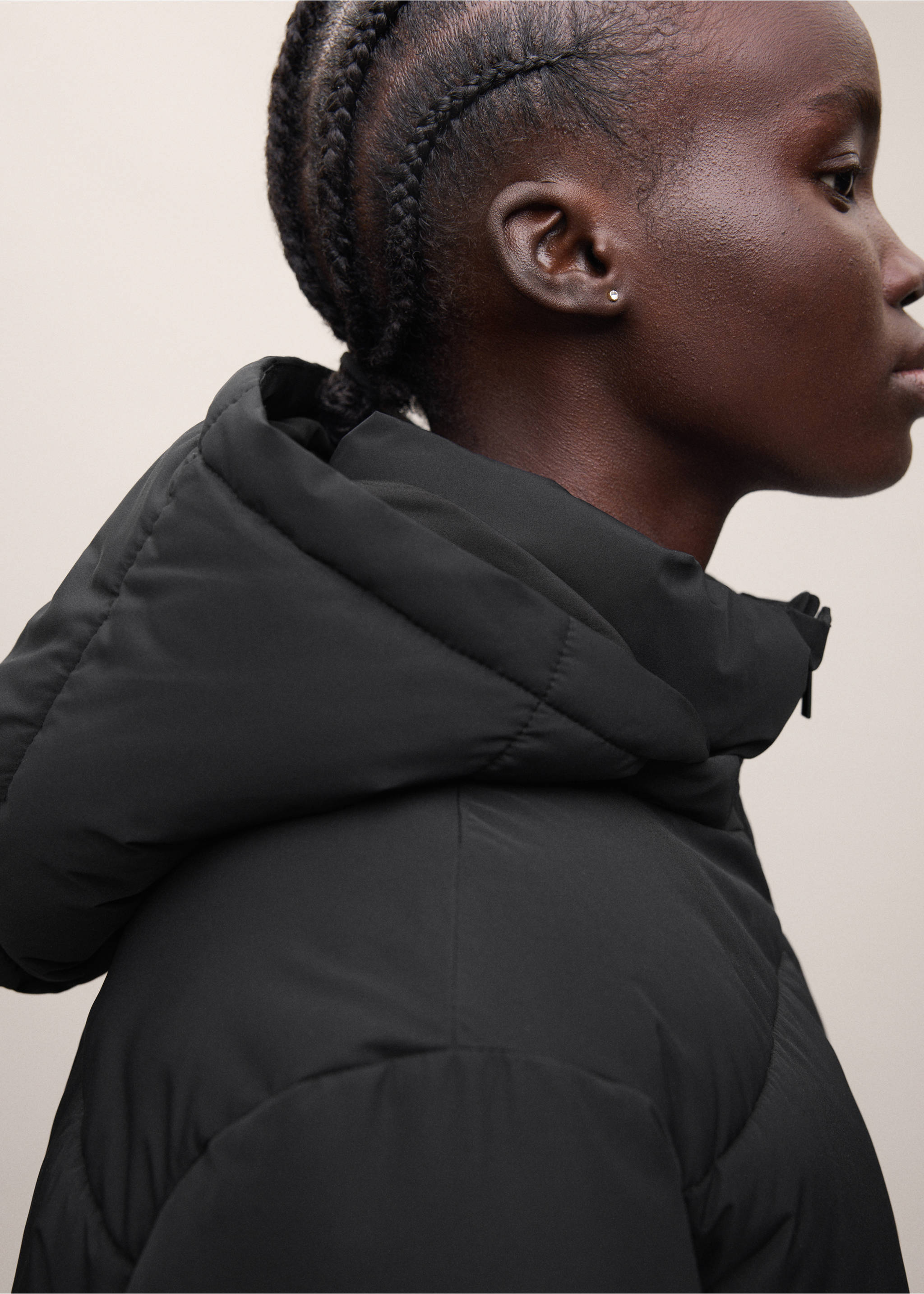 Close-up of a black hooded anorak with a high collar., Black. Ref: 37055166-01.