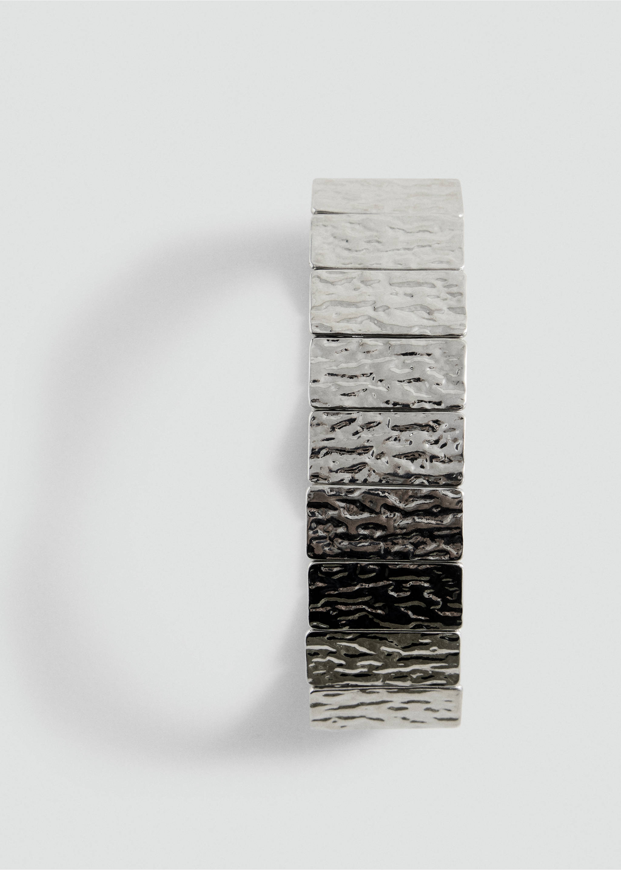 Close-up of a silver-toned textured metallic link bracelet., Silver. Ref: 37055180-00.